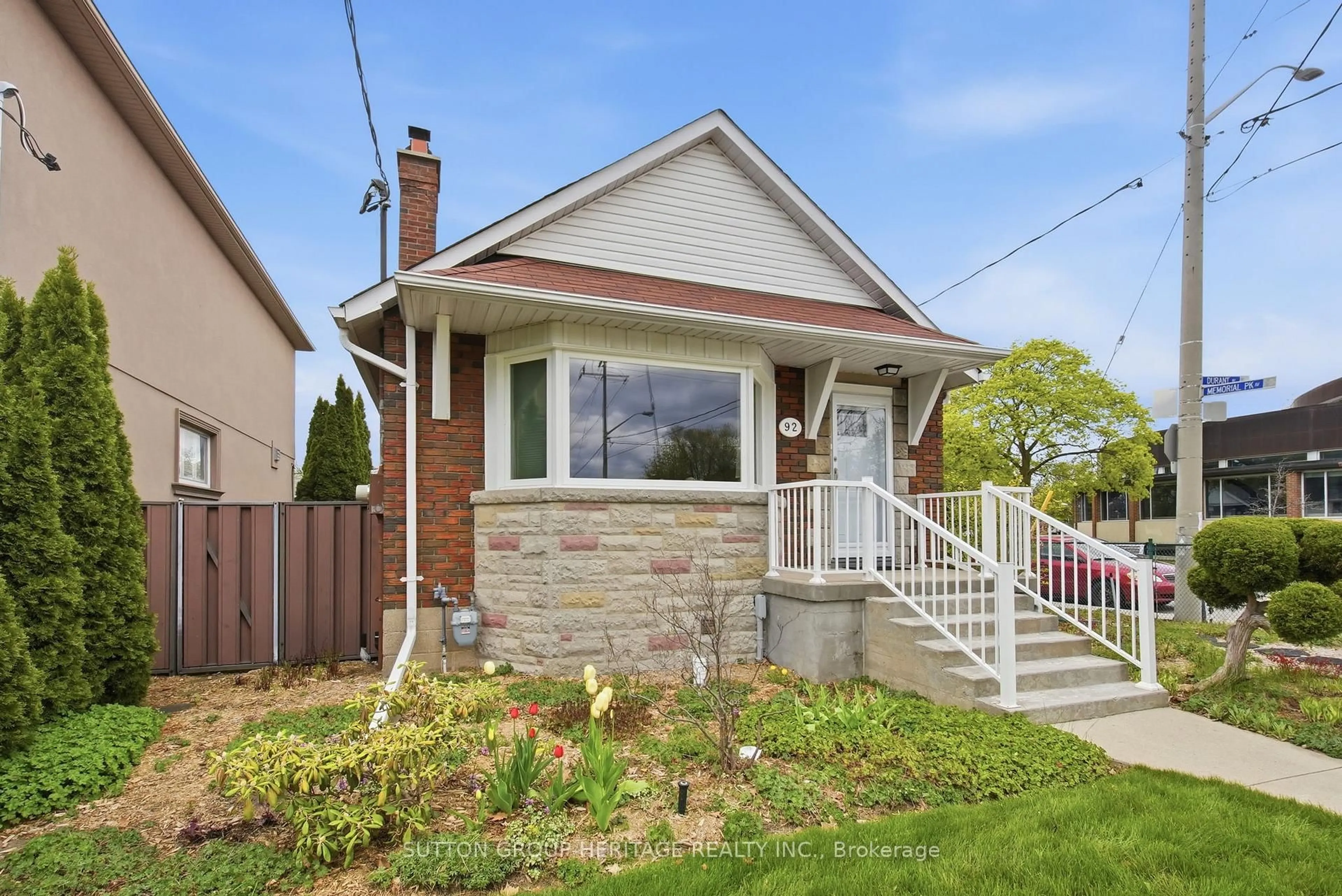 Home with brick exterior material, street for 92 Durant Ave, Toronto Ontario M4J 4W2