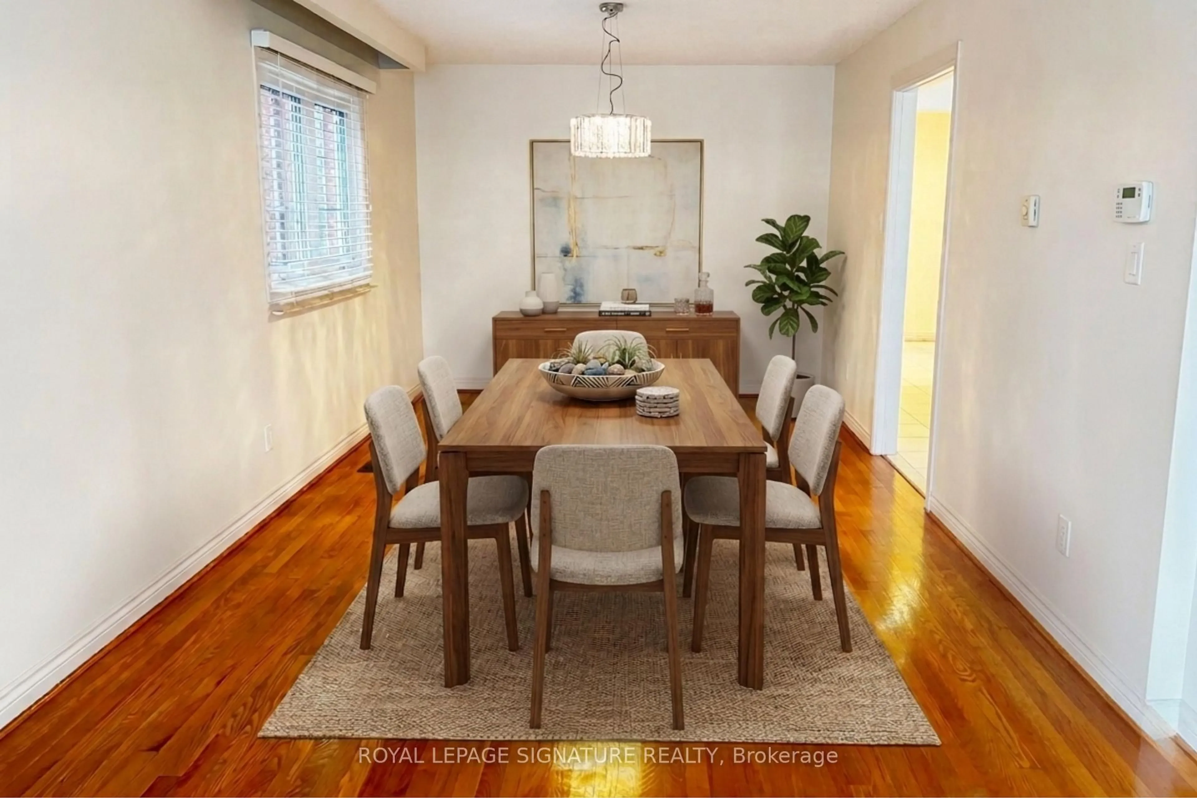 Dining room, wood/laminate floor for 248 Gowan Ave, Toronto Ontario M4J 2K6