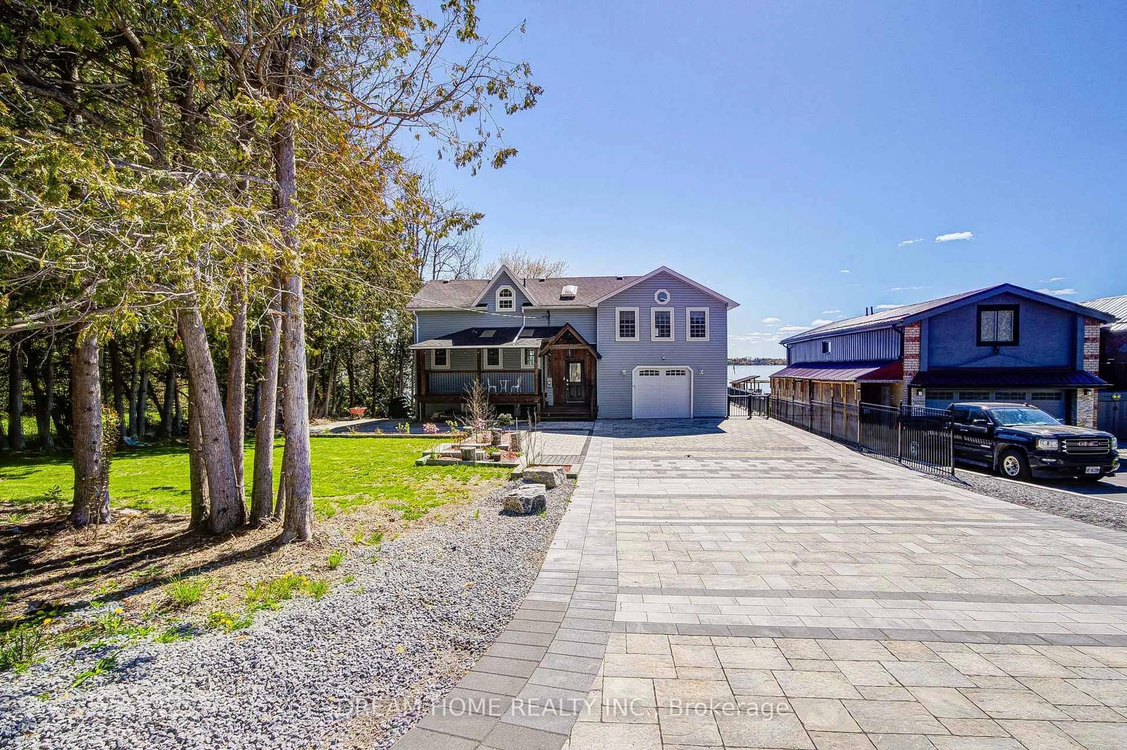 A pic from outside/outdoor area/front of a property/back of a property/a pic from drone, water/lake/river/ocean view for 339 Carnegie Beach Rd, Scugog Ontario L9L 1B6