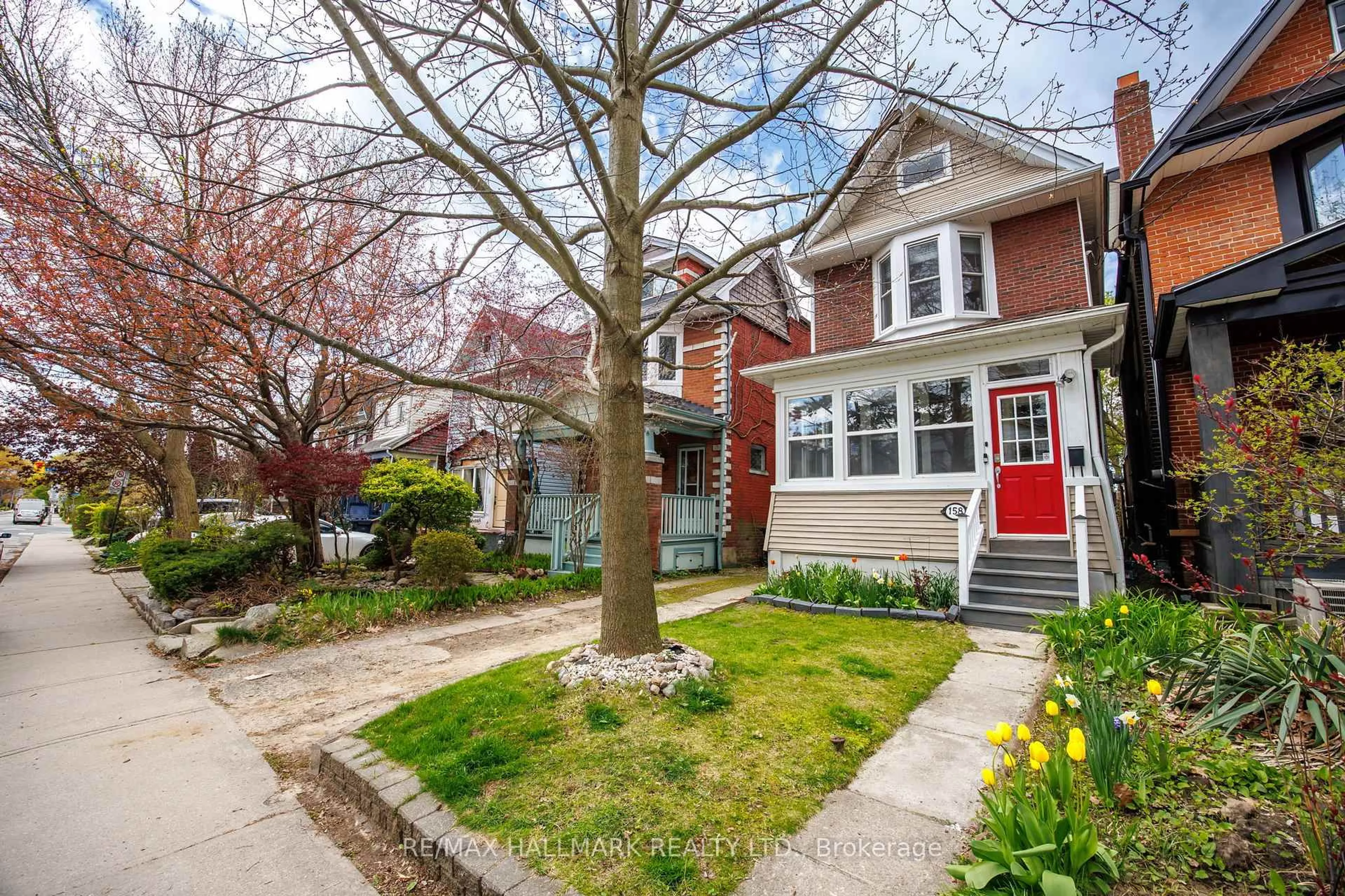 Home with brick exterior material, street for 158 Woodfield Rd, Toronto Ontario M4L 2W7