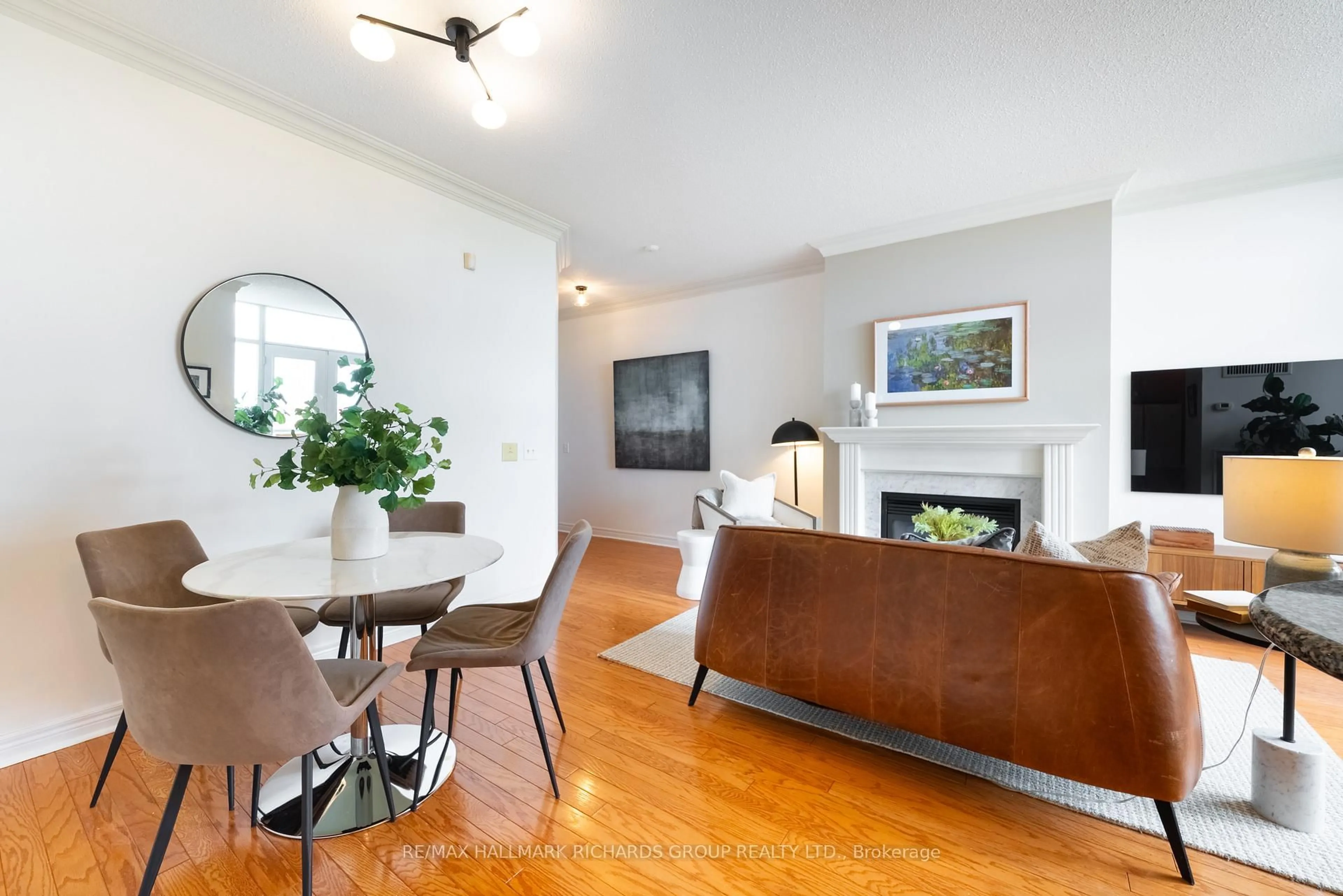 Living room with furniture, wood/laminate floor for 9 Boardwalk Dr #405, Toronto Ontario M4L 6T1