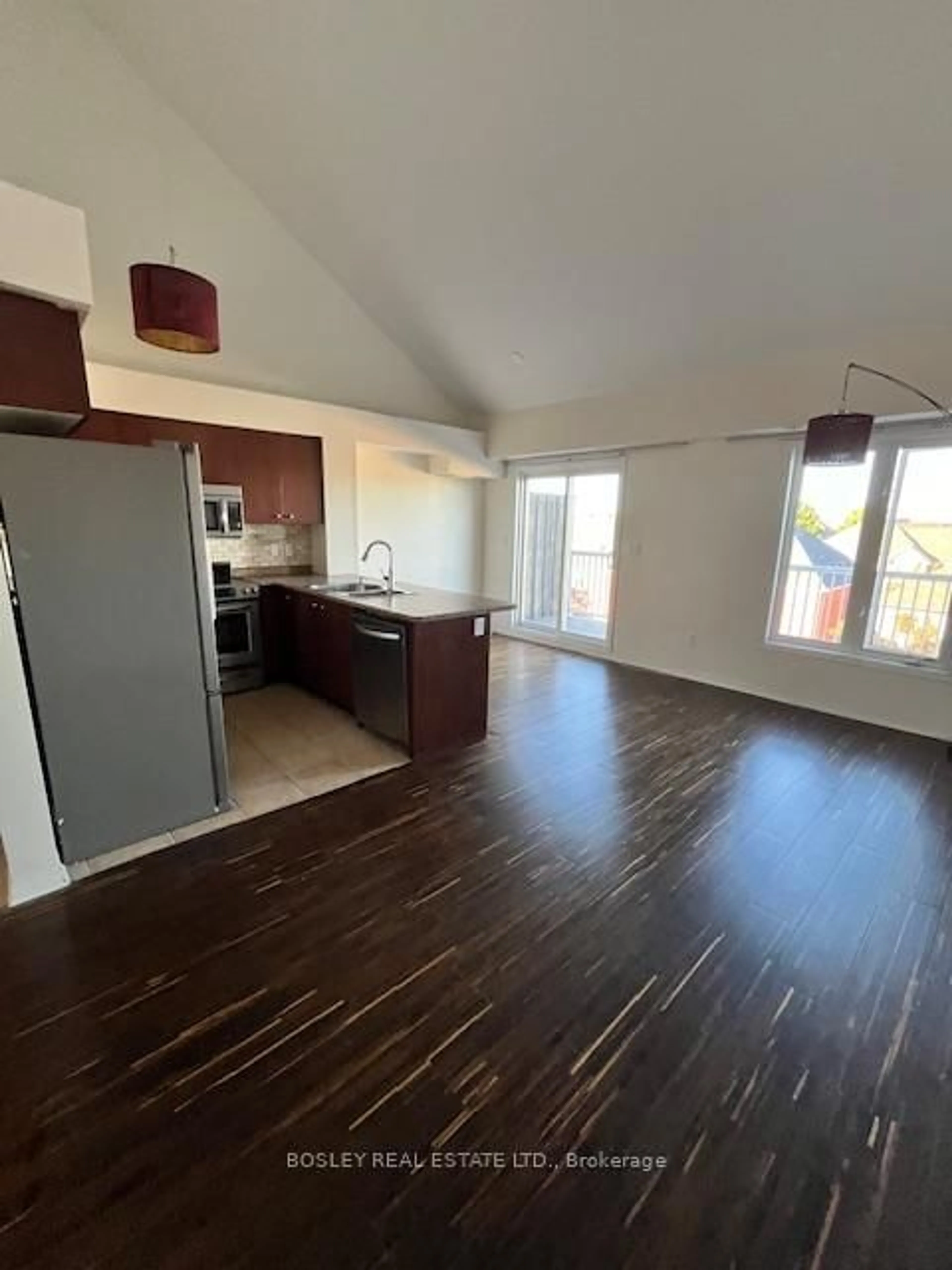 Open concept kitchen, wood/laminate floor for 647C Warden Ave #11, Toronto Ontario M1L 0E7