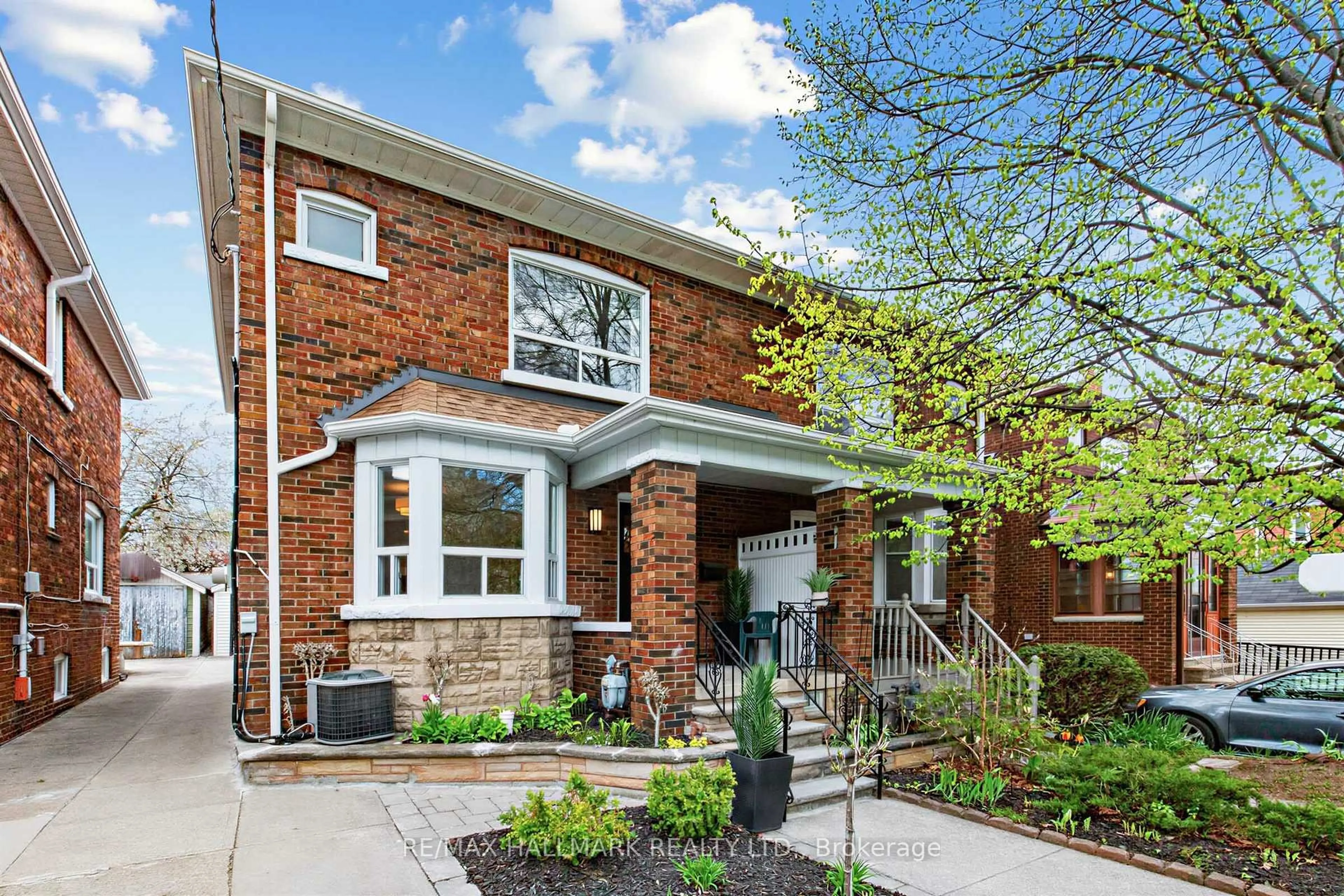 Home with brick exterior material, street for 34 Springdale Blvd, Toronto Ontario M4J 1W5