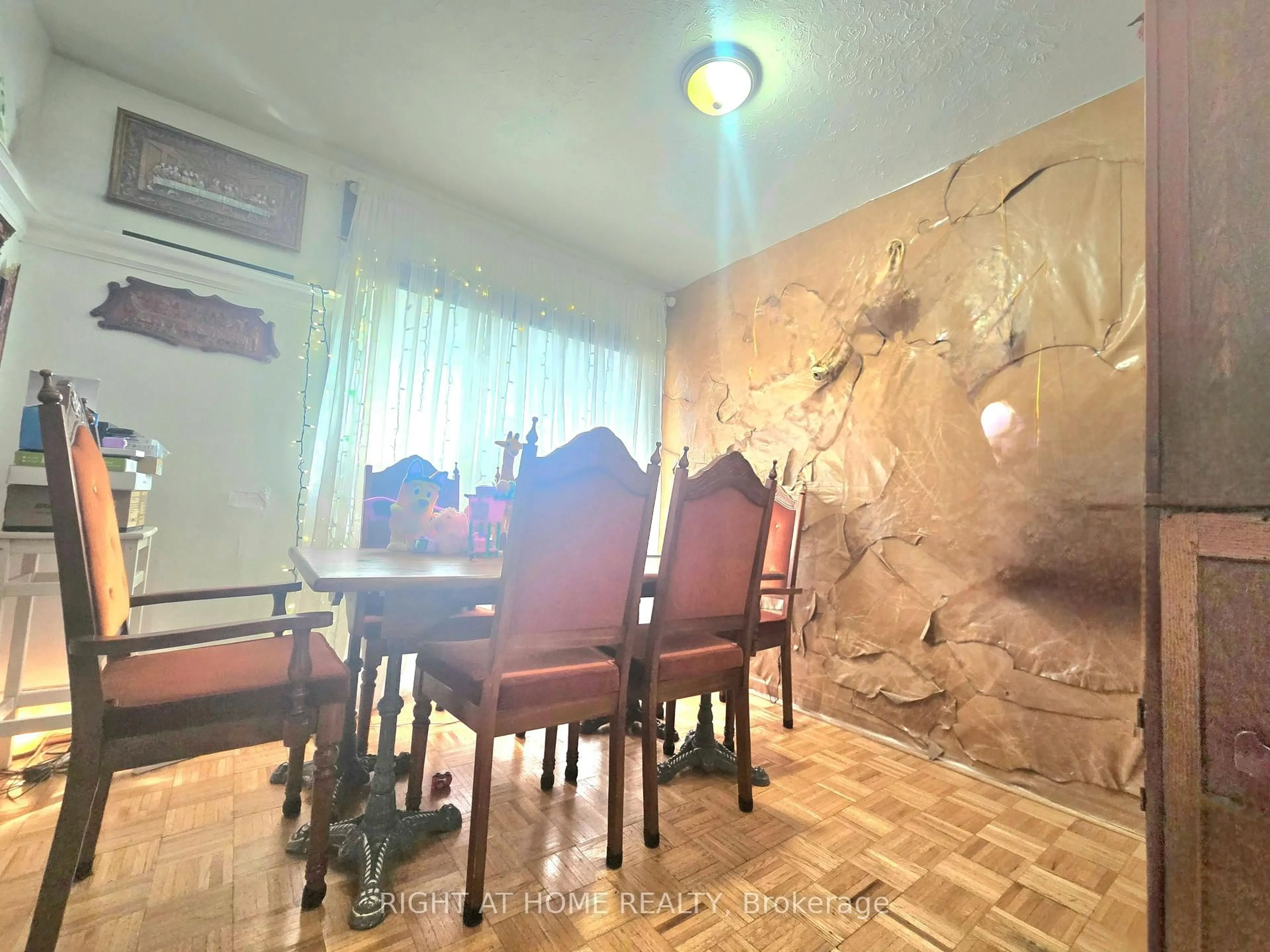 Dining room, wood/laminate floor for 633 Greenwood Ave, Toronto Ontario M4J 4B1
