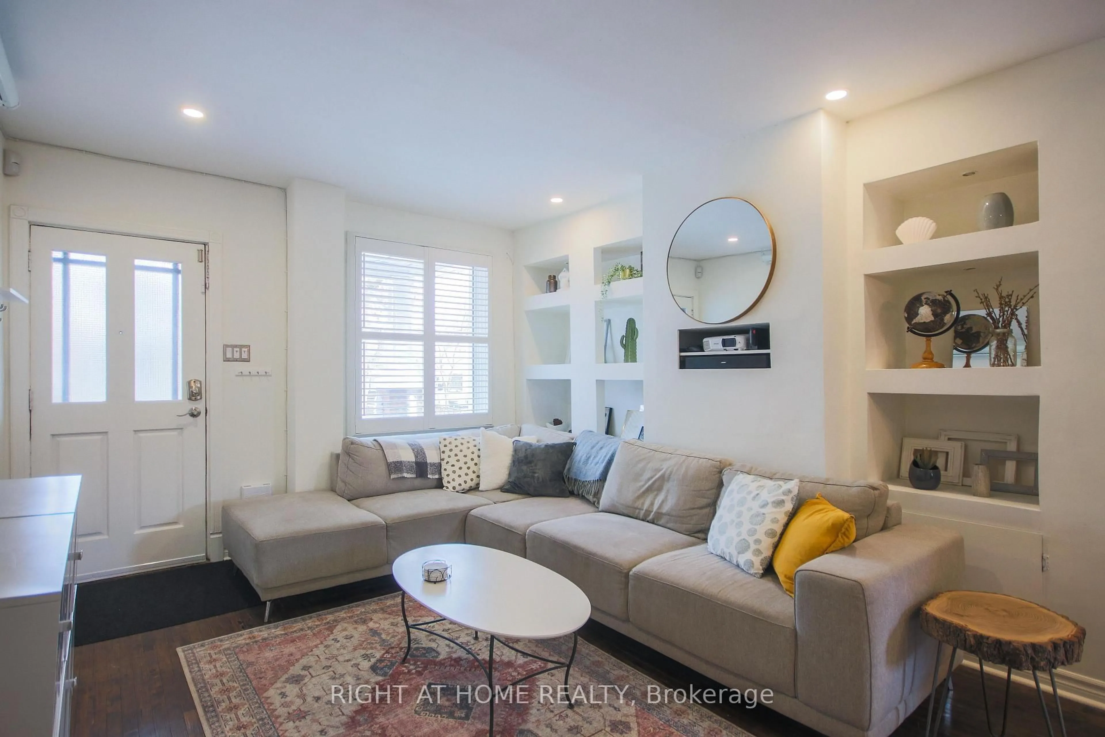 Living room with furniture, unknown for 44 Rhodes Ave, Toronto Ontario M4L 2Z9