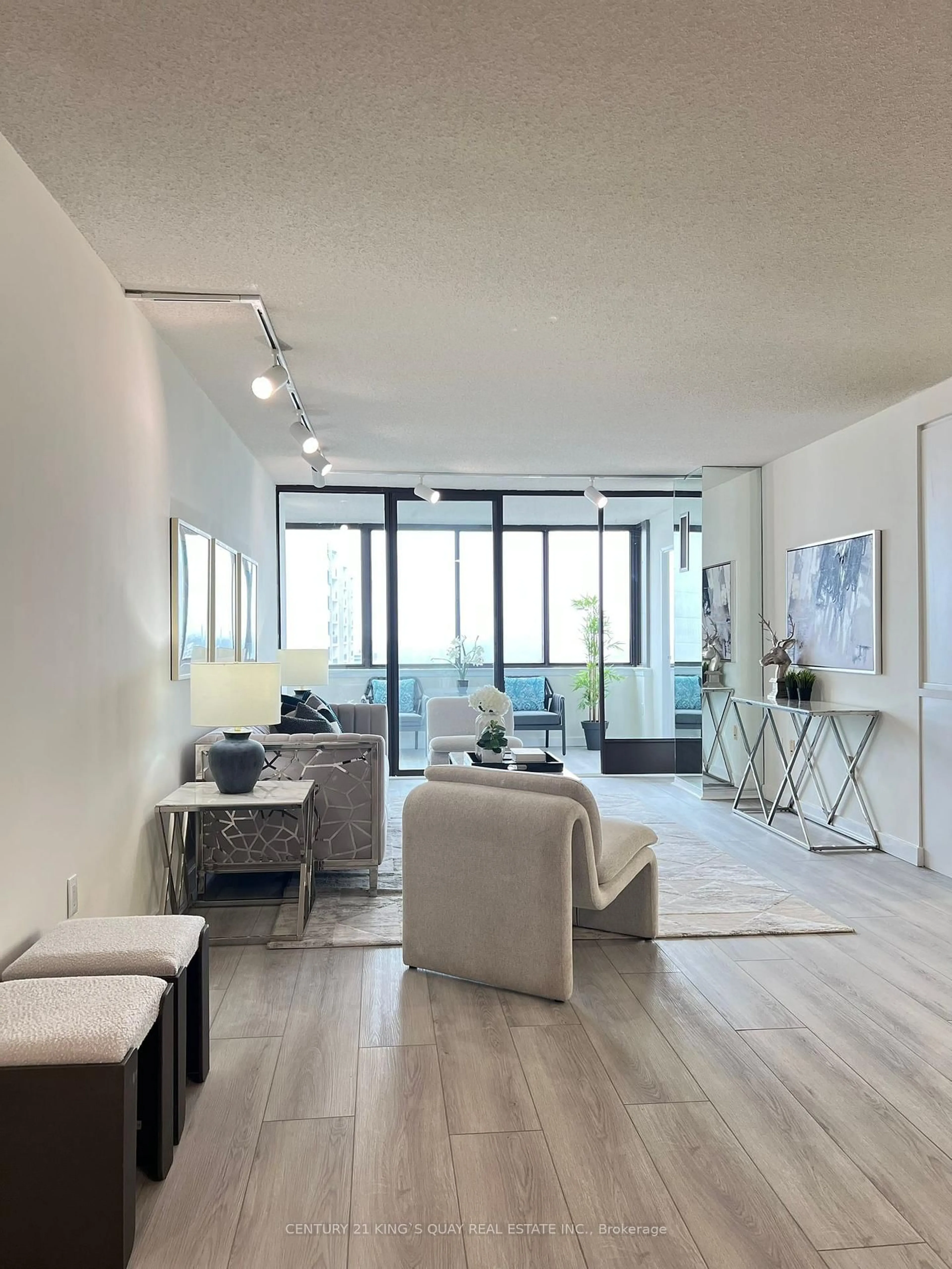 Living room with furniture, unknown for 2330 Bridletowne Circ #2012, Toronto Ontario M1W 3P6