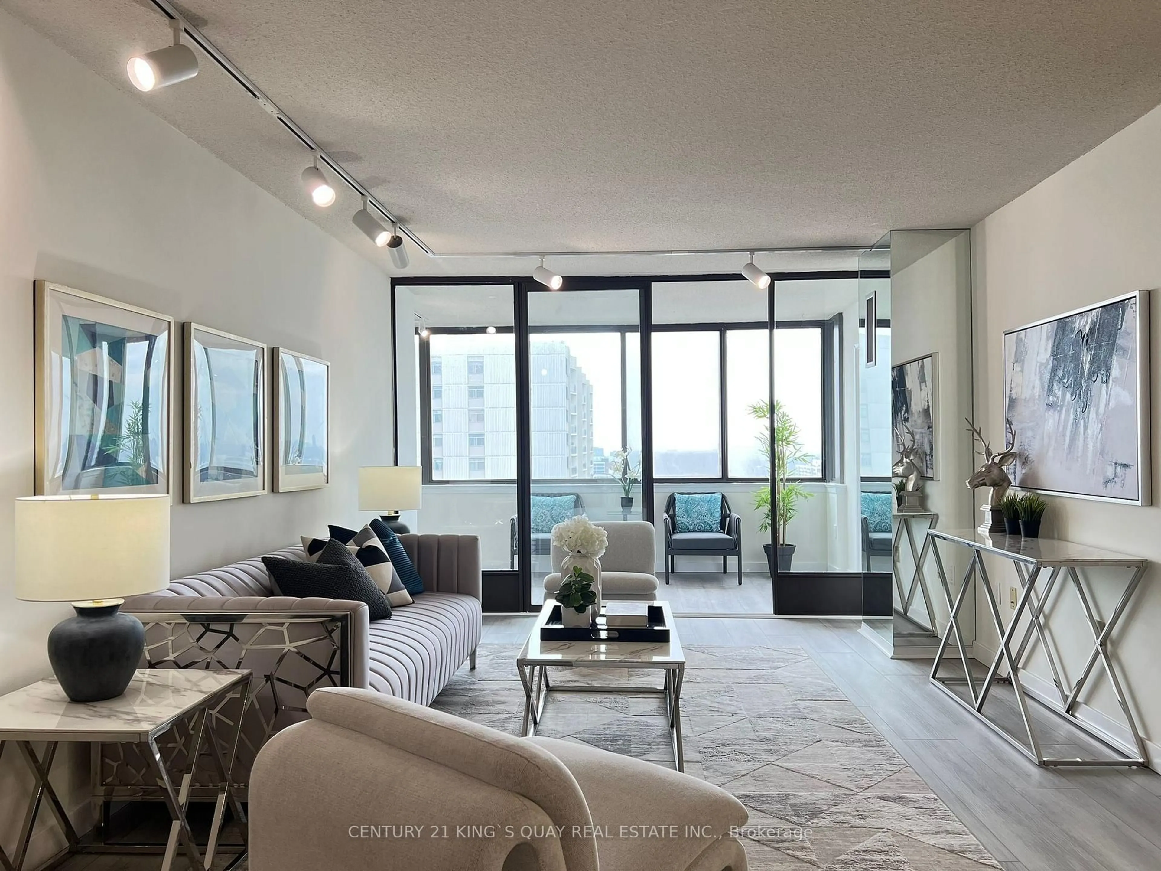 Living room with furniture, unknown for 2330 Bridletowne Circ #2012, Toronto Ontario M1W 3P6