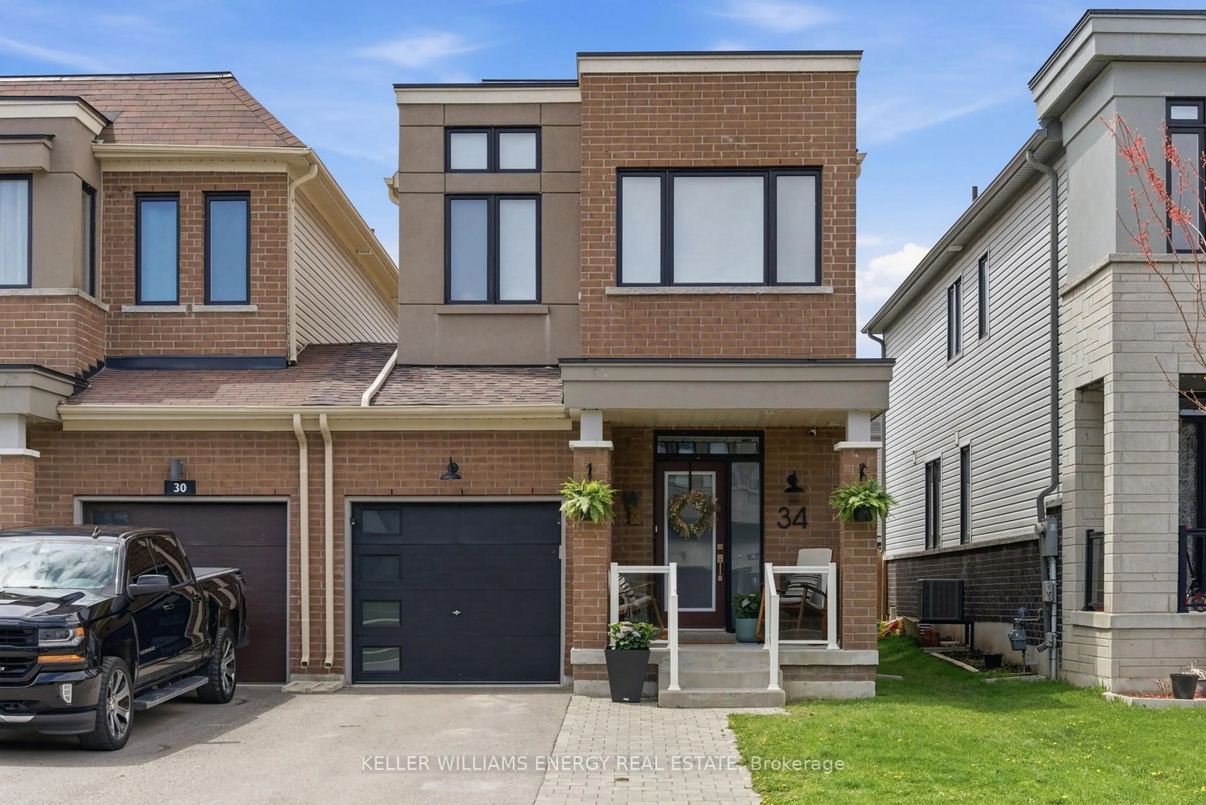 Home with brick exterior material, street for 34 Larkin Lane, Clarington Ontario L1C 2W3