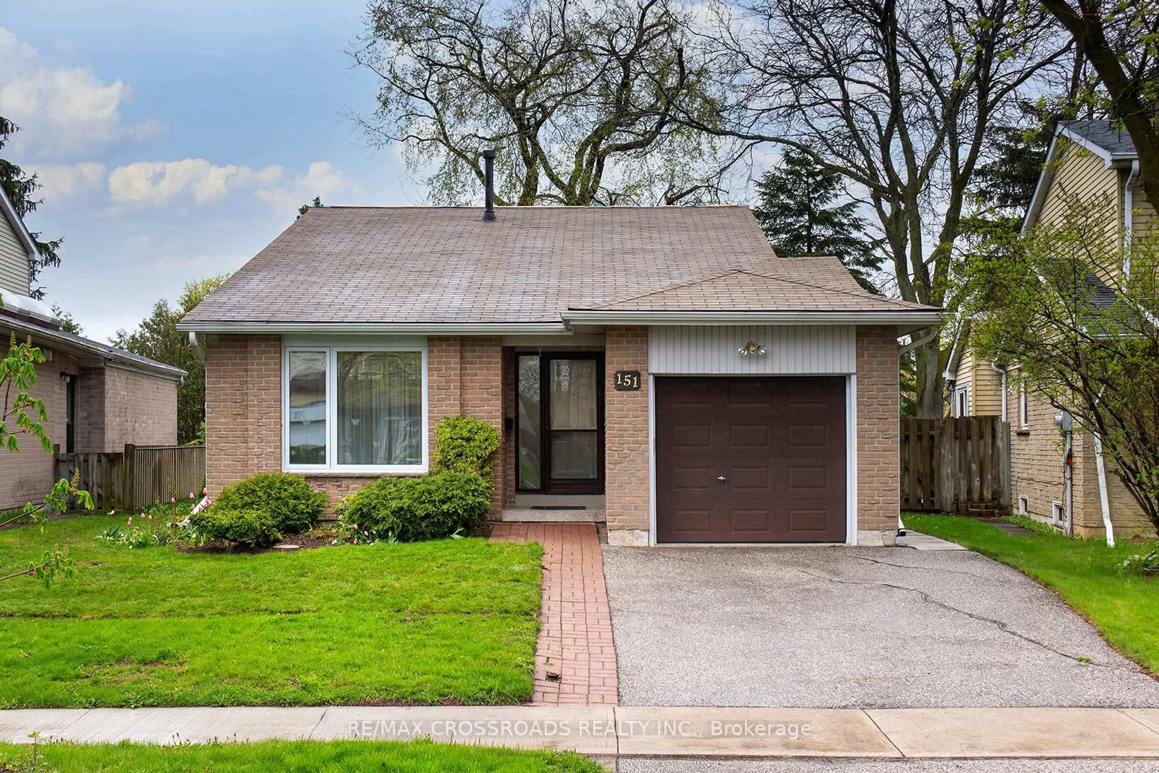 Home with brick exterior material, street for 151 Goldhawk Tr, Toronto Ontario M1V 1X1
