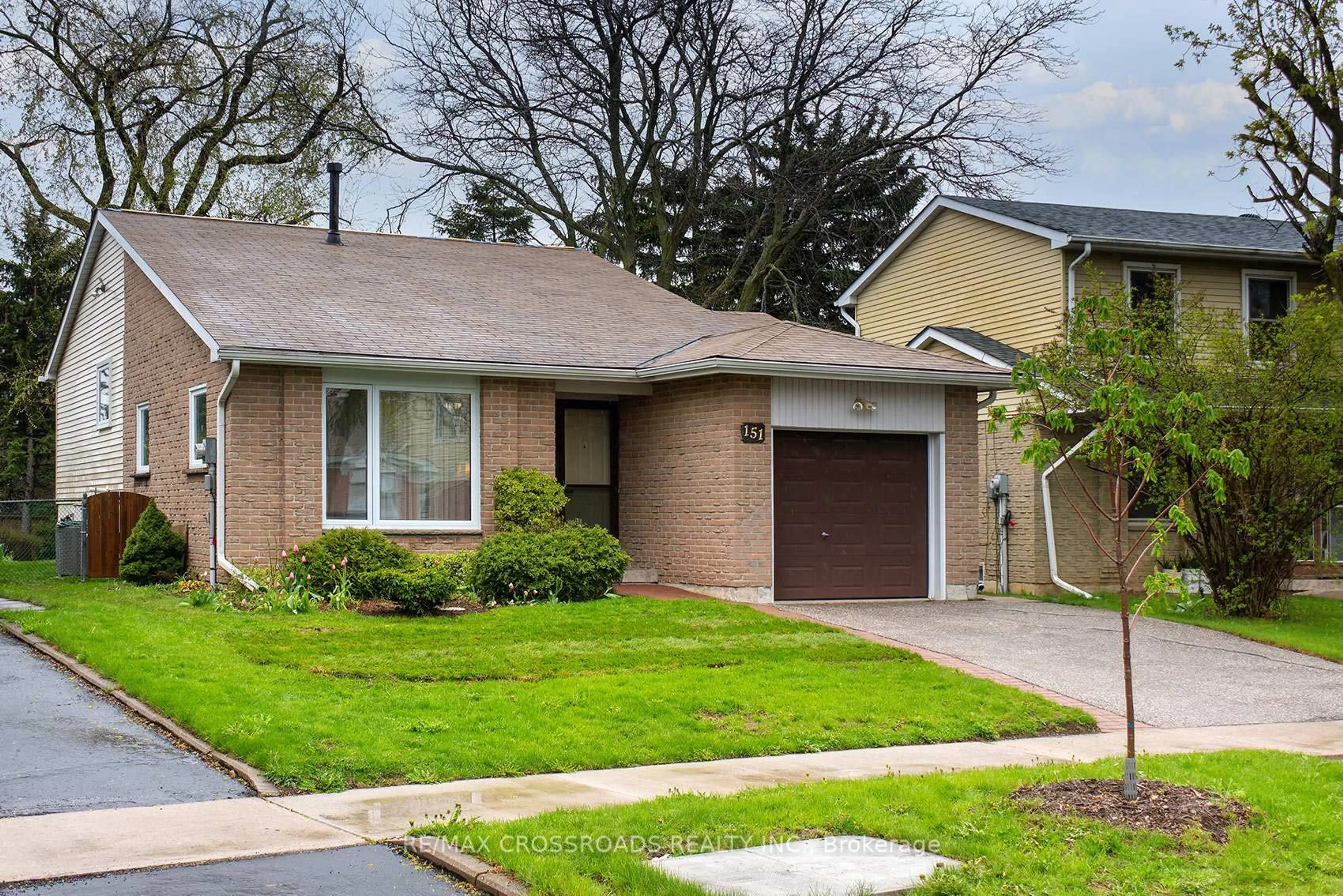 Home with brick exterior material, street for 151 Goldhawk Tr, Toronto Ontario M1V 1X1