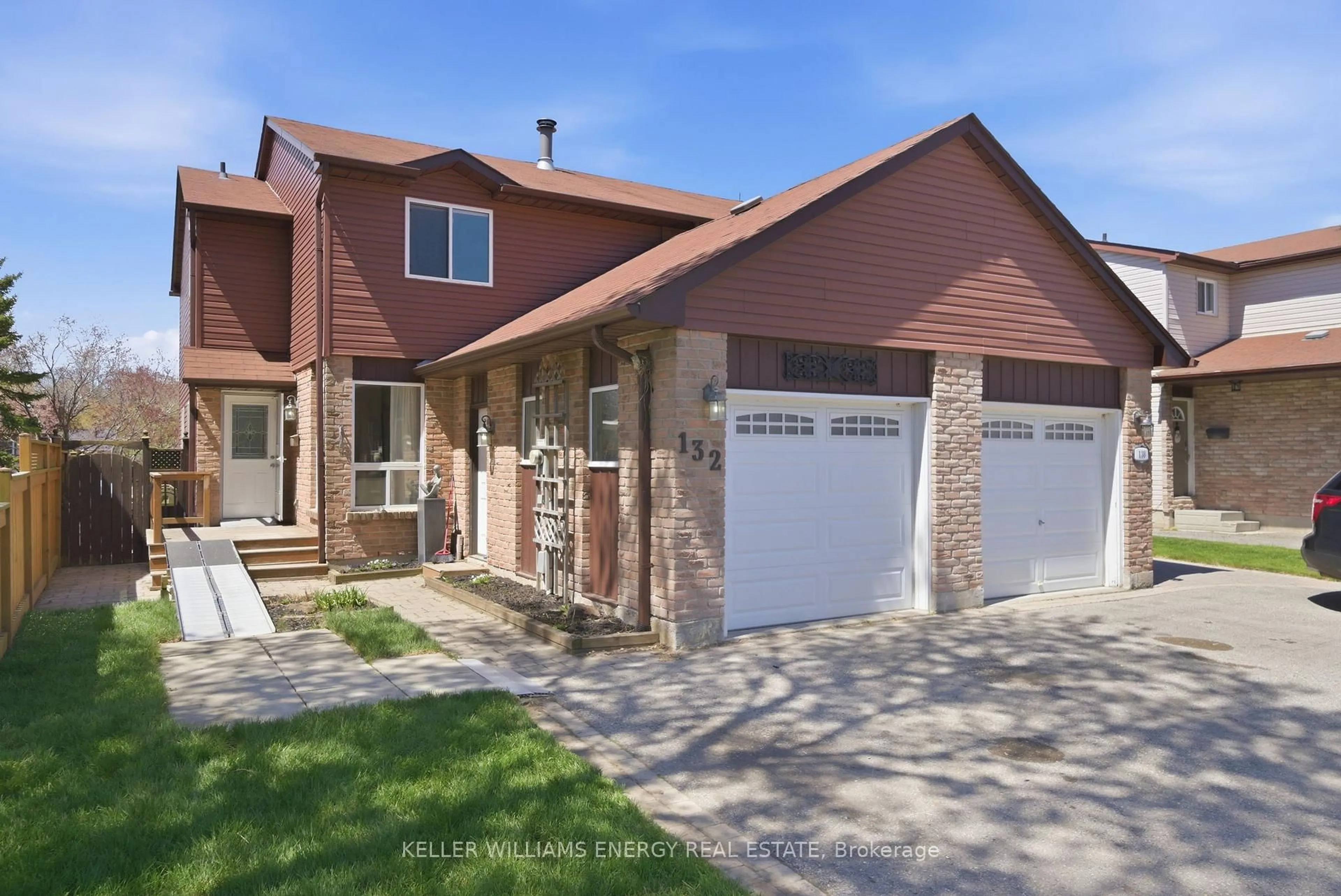 Home with brick exterior material, street for 132 Castlebar Cres, Oshawa Ontario L1J 7B4