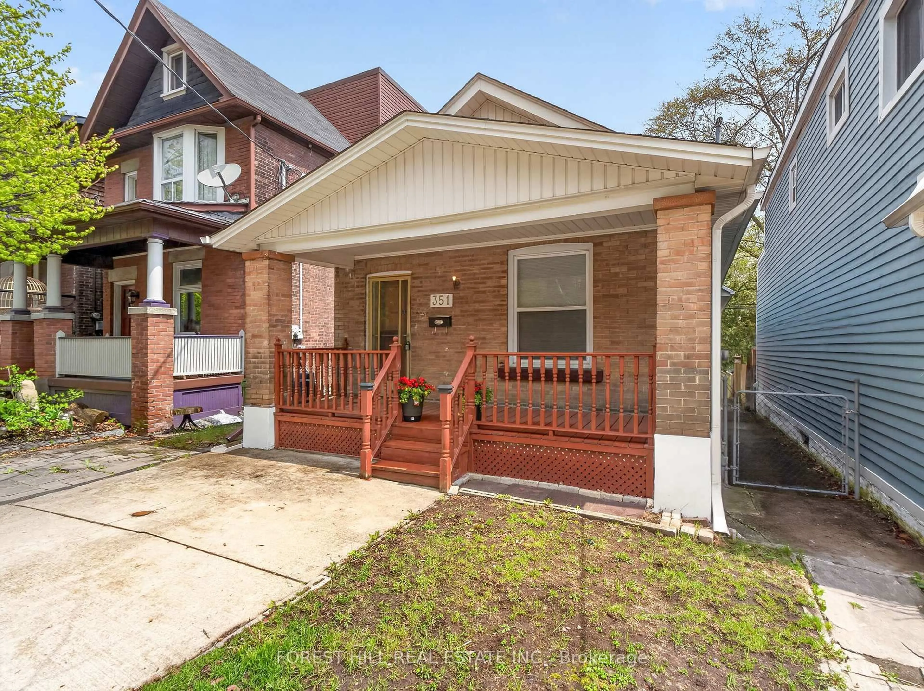 Home with brick exterior material, street for 351 Woodfield Rd, Toronto Ontario M4L 2W9