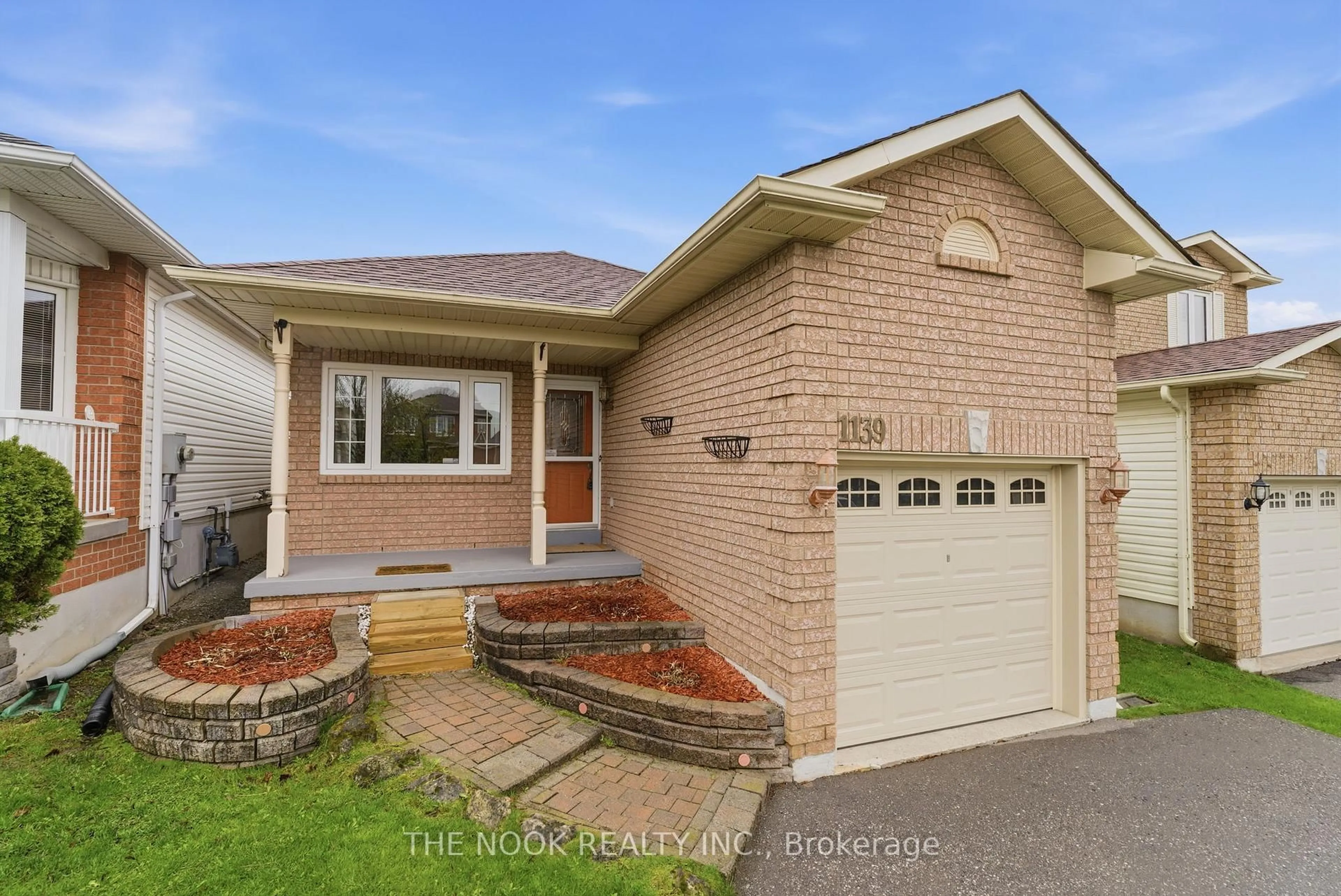 Home with brick exterior material, street for 1139 Ridgemount Blvd, Oshawa Ontario L1K 2L1