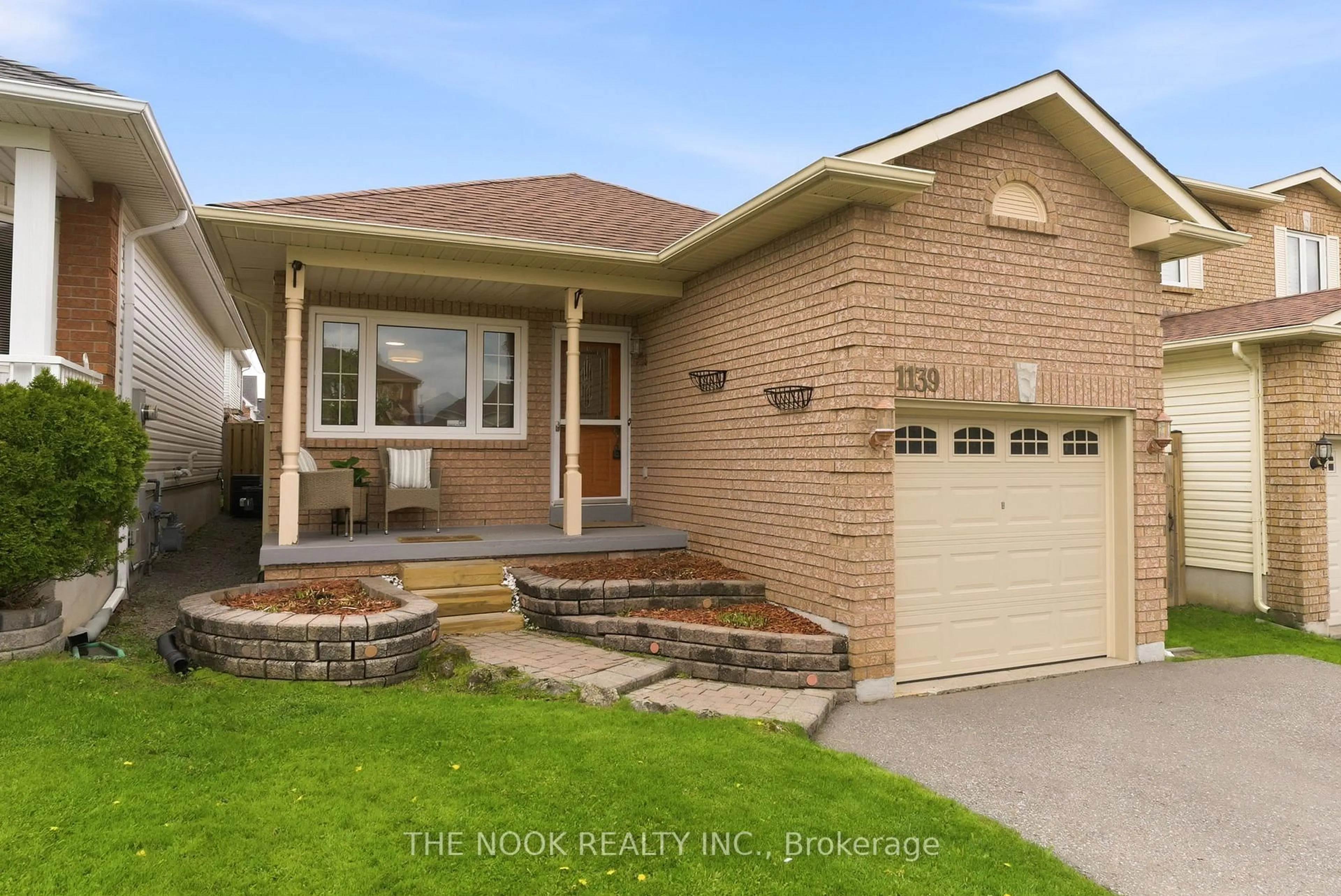Home with brick exterior material, street for 1139 Ridgemount Blvd, Oshawa Ontario L1K 2L1