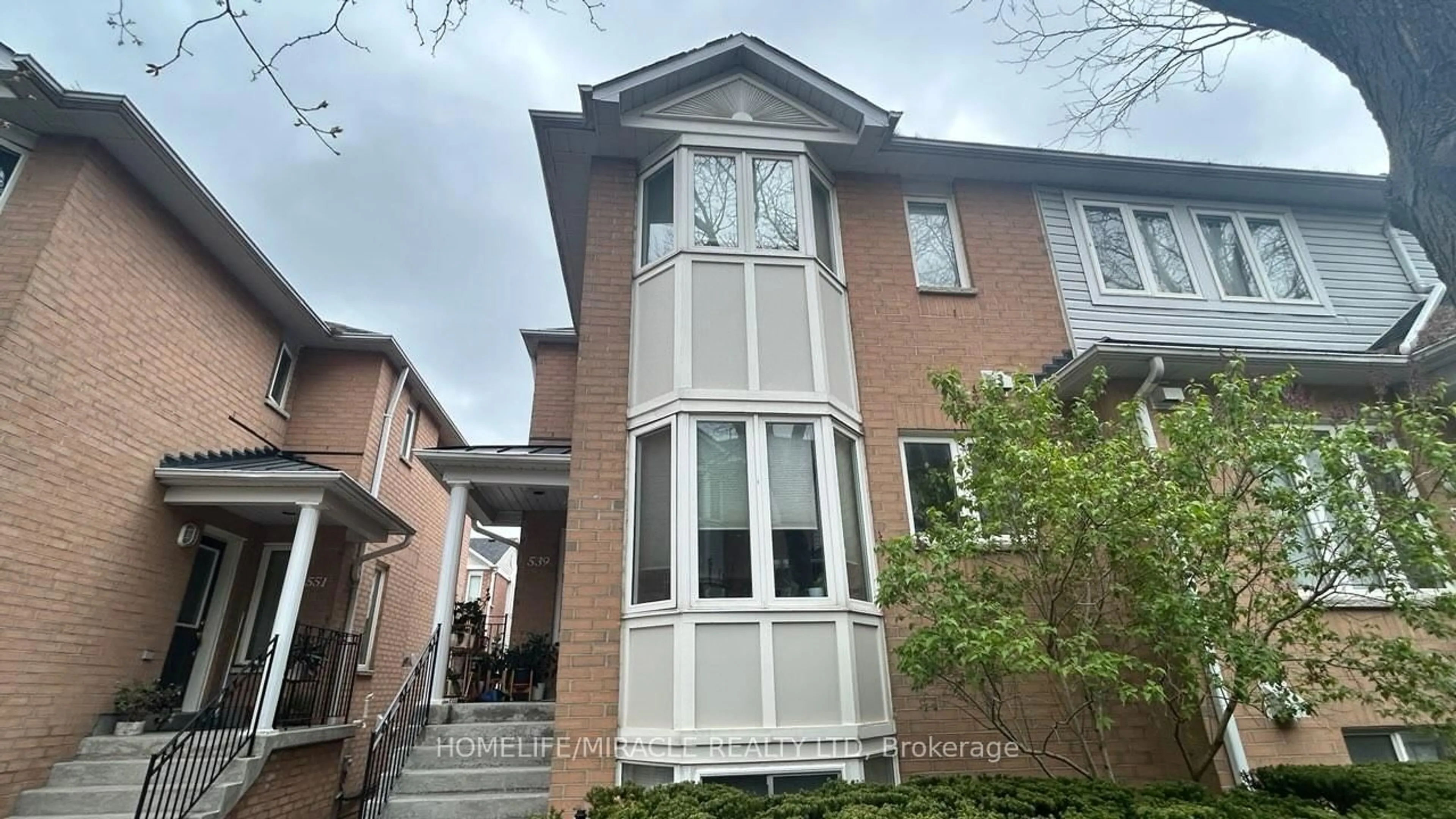 Home with brick exterior material, street for 83 Mondeo Dr #539, Toronto Ontario M1P 5B6