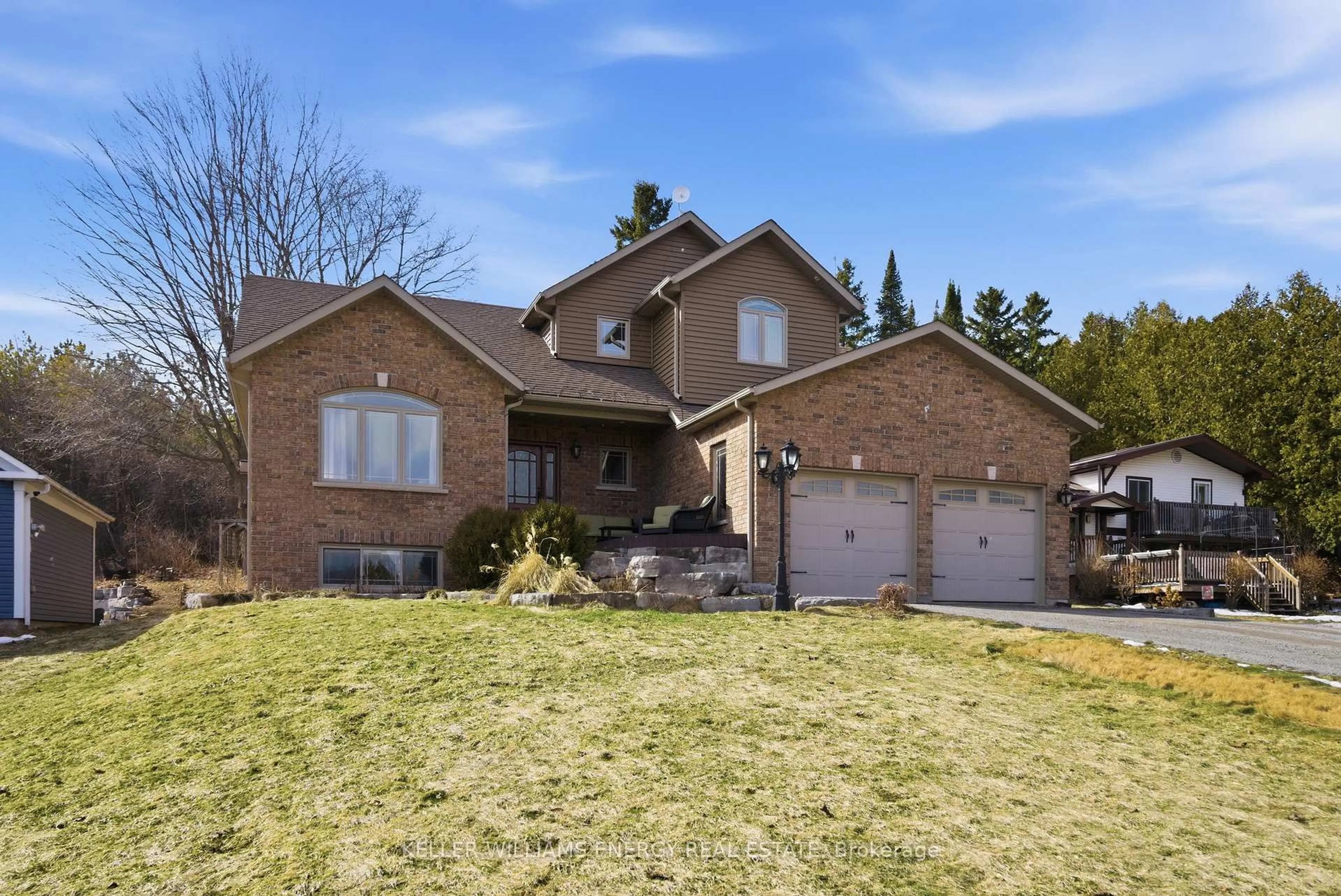 Home with brick exterior material, street for 332 Carnegie Beach Rd, Scugog Ontario L9L 1B6