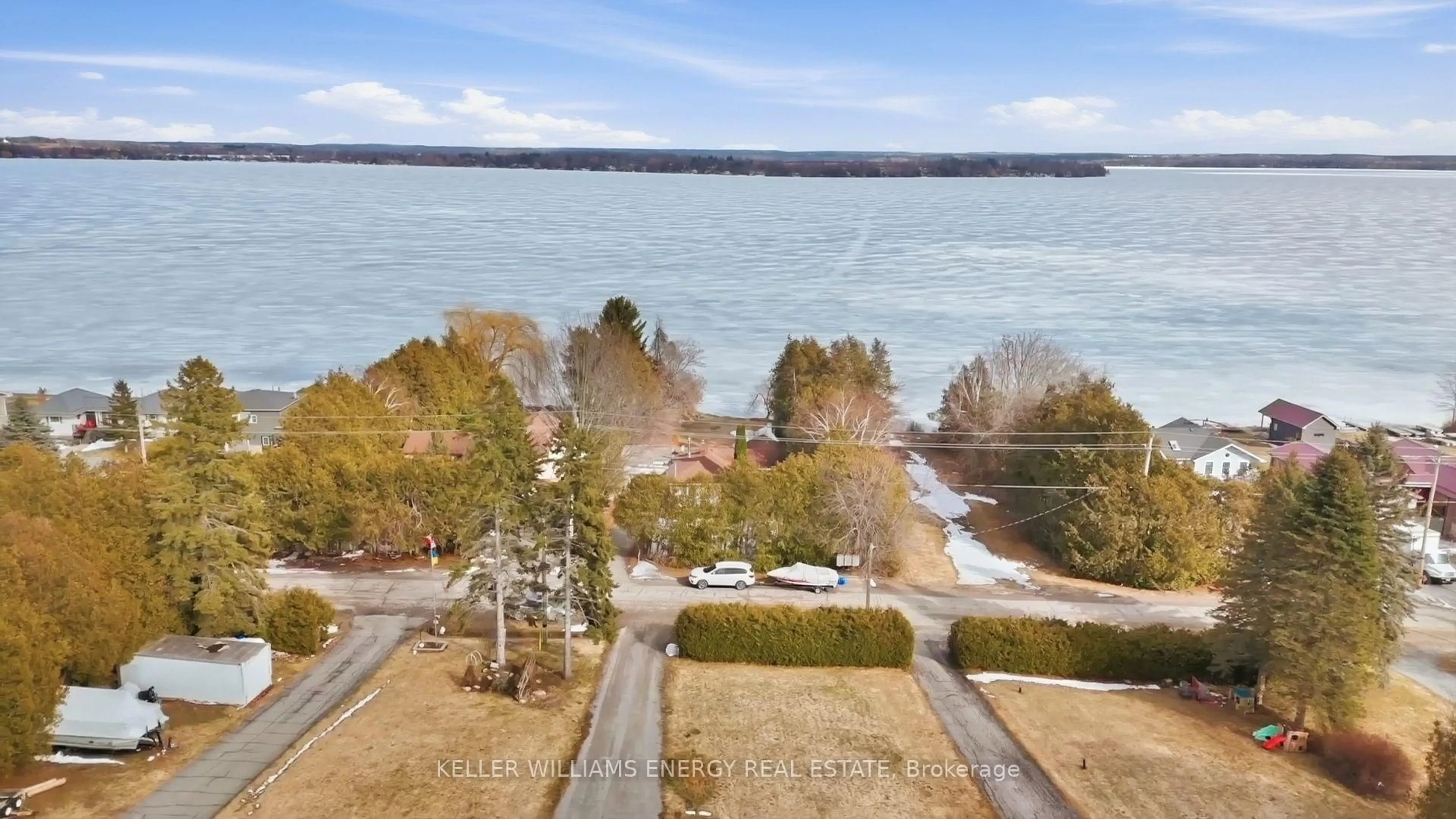 A pic from outside/outdoor area/front of a property/back of a property/a pic from drone, water/lake/river/ocean view for 332 Carnegie Beach Rd, Scugog Ontario L9L 1B6