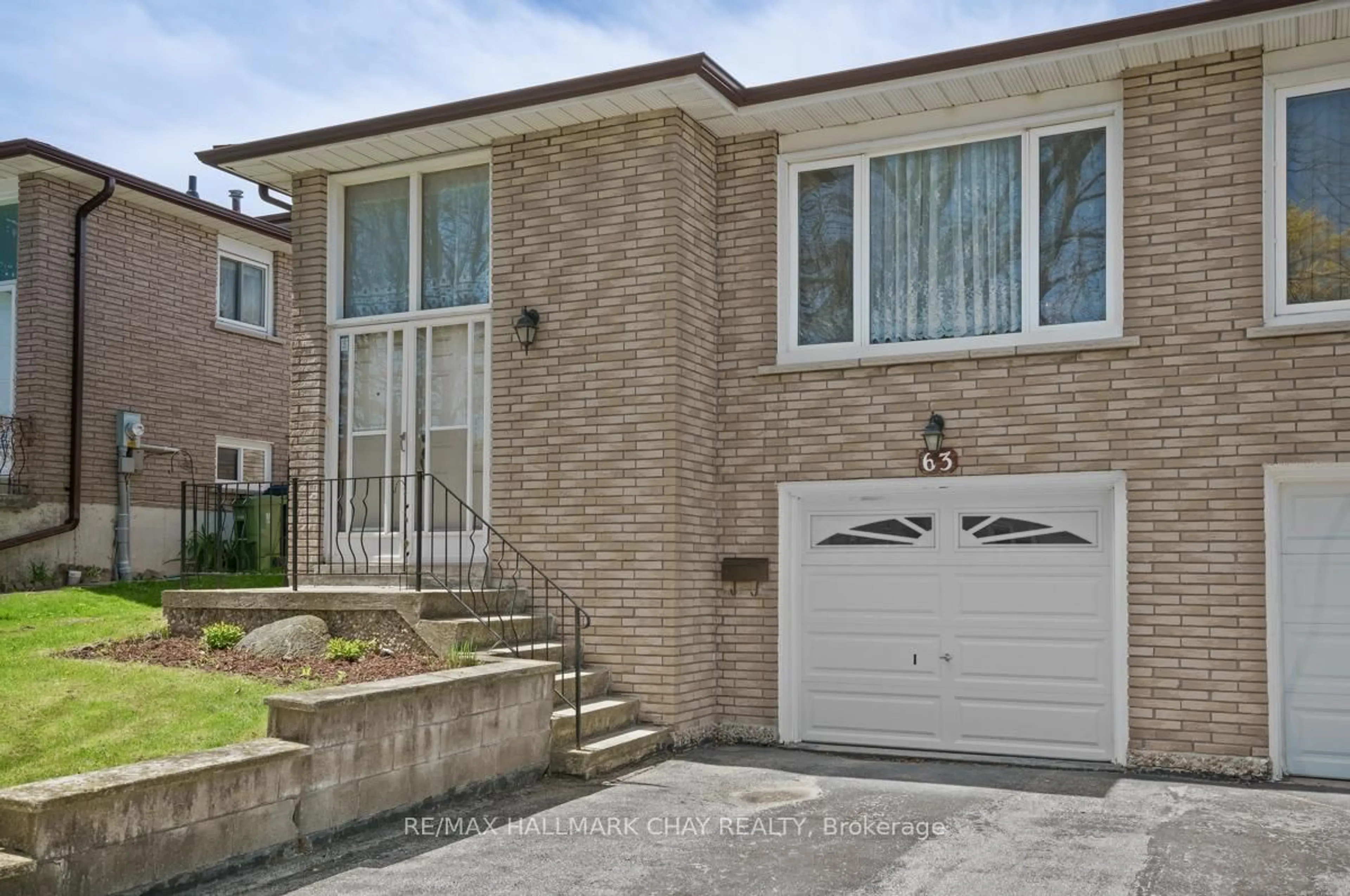 Home with brick exterior material, street for 63 Fred Bland Cres, Toronto Ontario M1J 3L7
