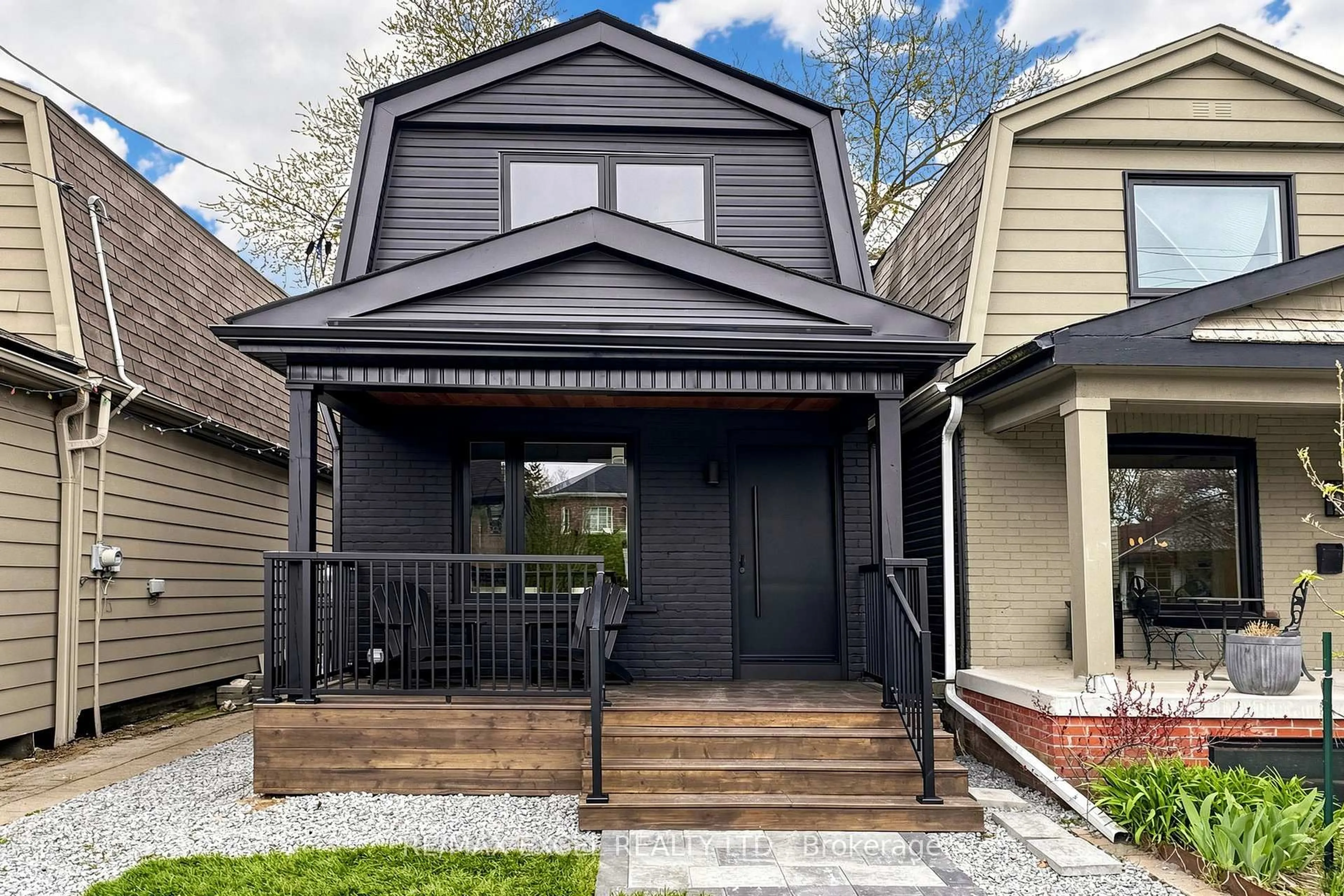 Home with vinyl exterior material, street for 227 Donlands Ave, Toronto Ontario M4J 3P9