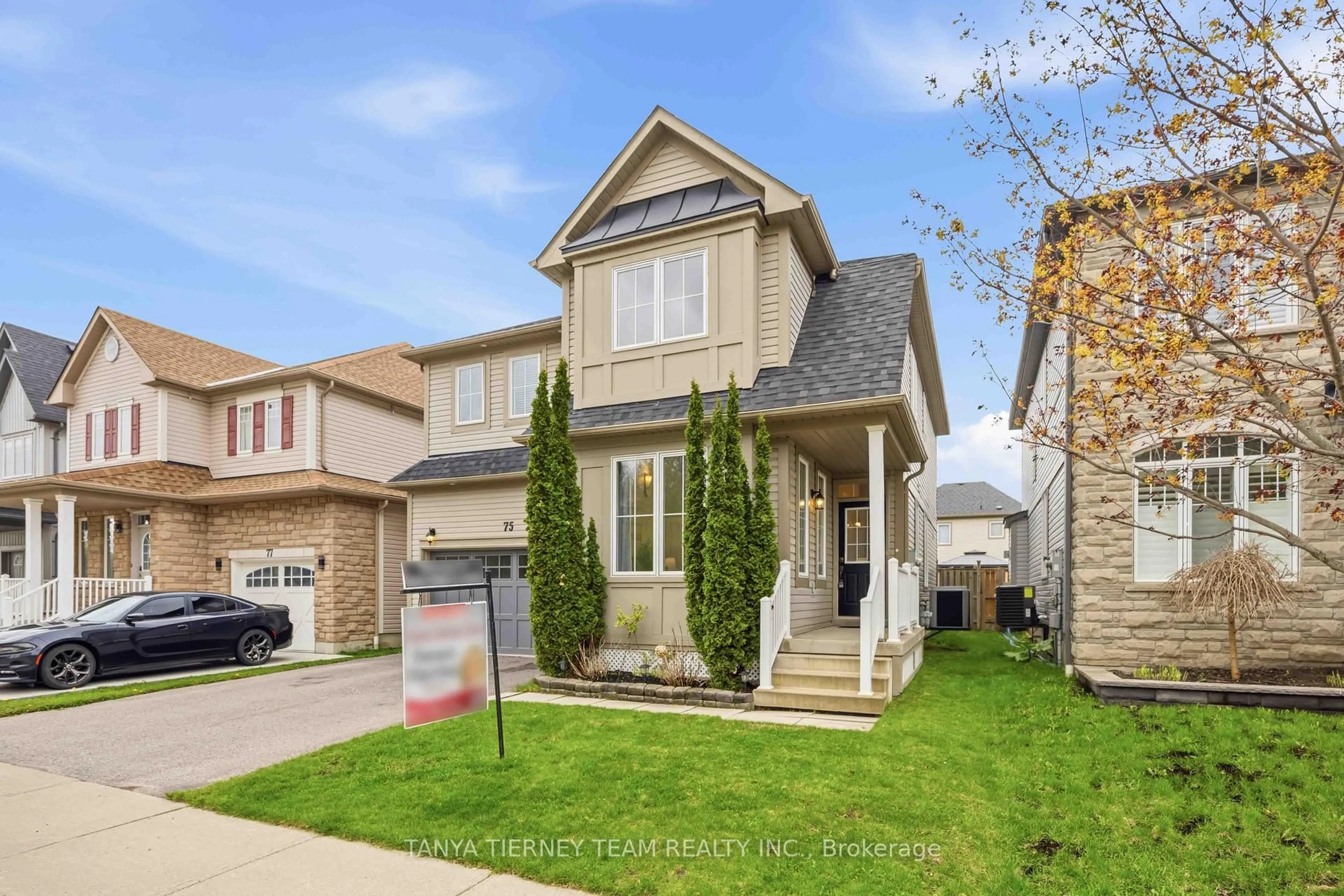 Home with vinyl exterior material, street for 75 Robert Attersley Dr, Whitby Ontario L1R 0B7