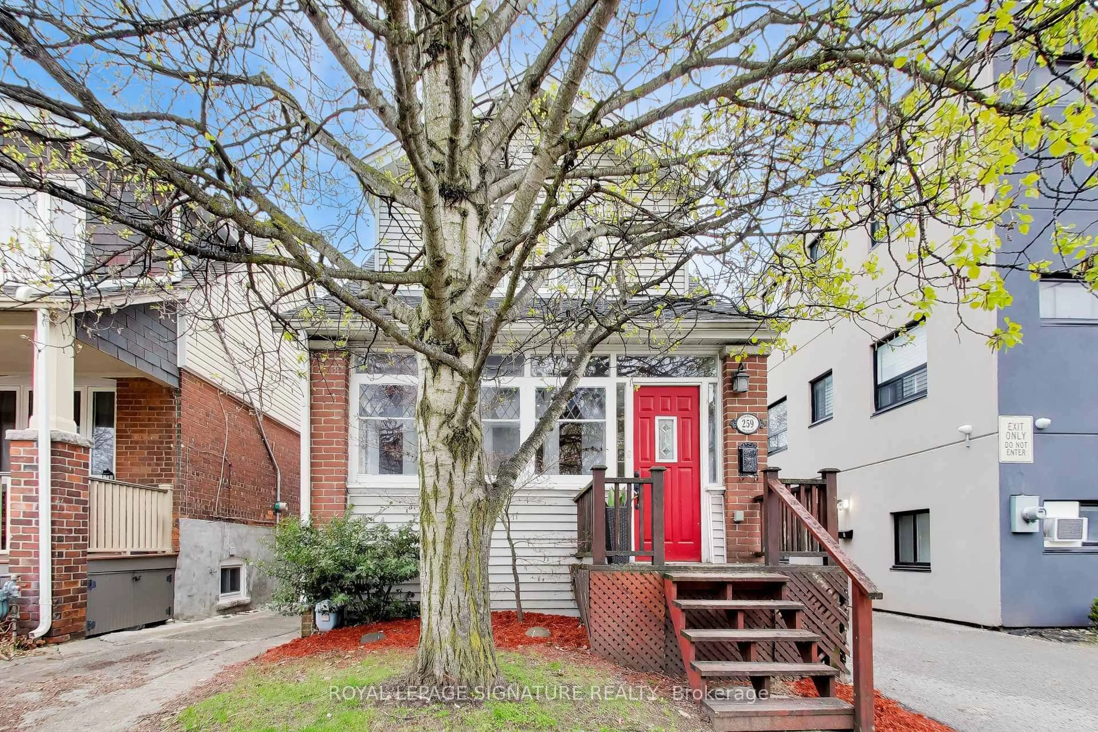 Home with brick exterior material, street for 259 Torrens Ave, Toronto Ontario M4J 2P6