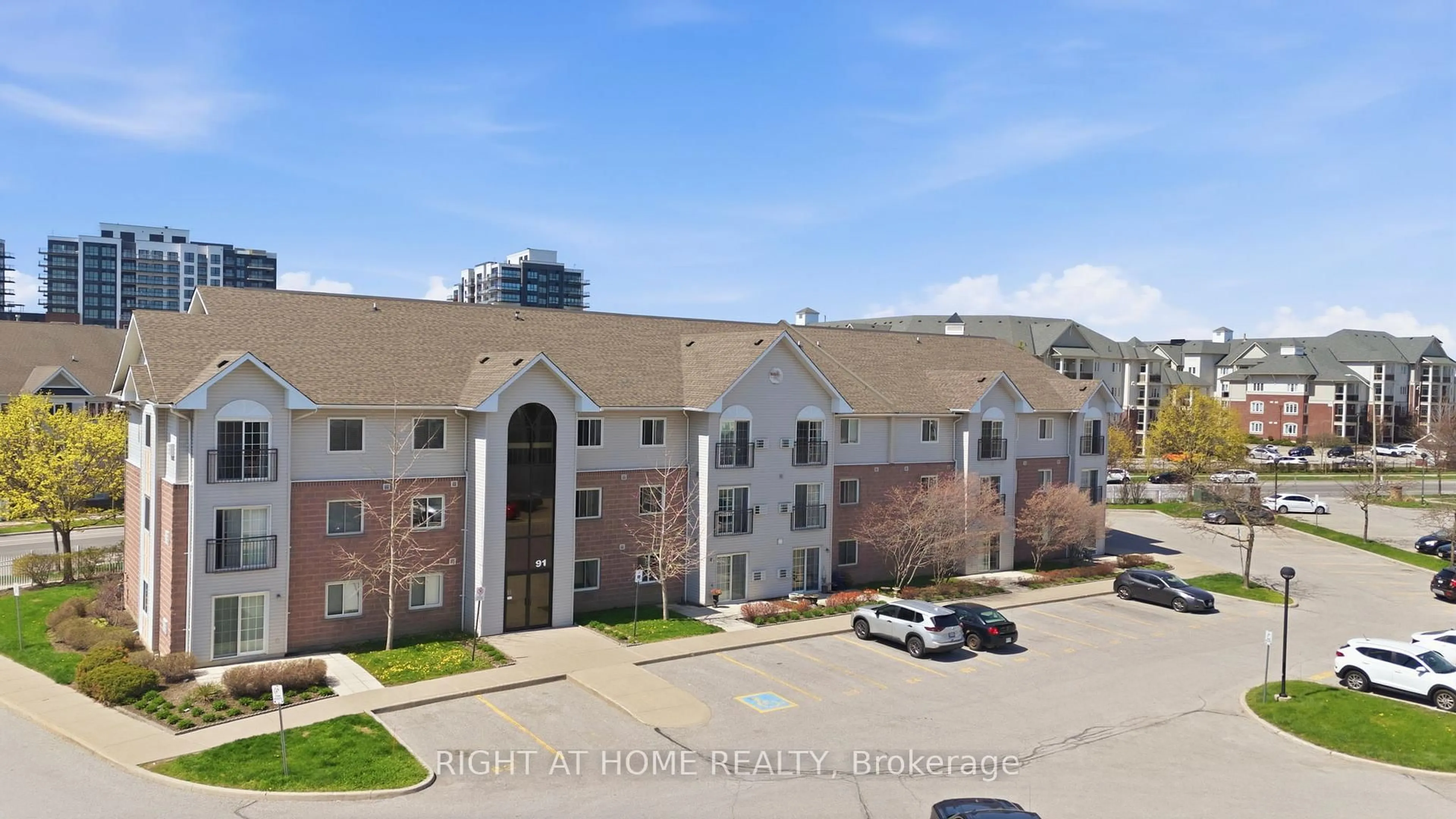 A pic from outside/outdoor area/front of a property/back of a property/a pic from drone, unknown for 91 Aspen Springs Dr #102, Clarington Ontario L1C 5J9