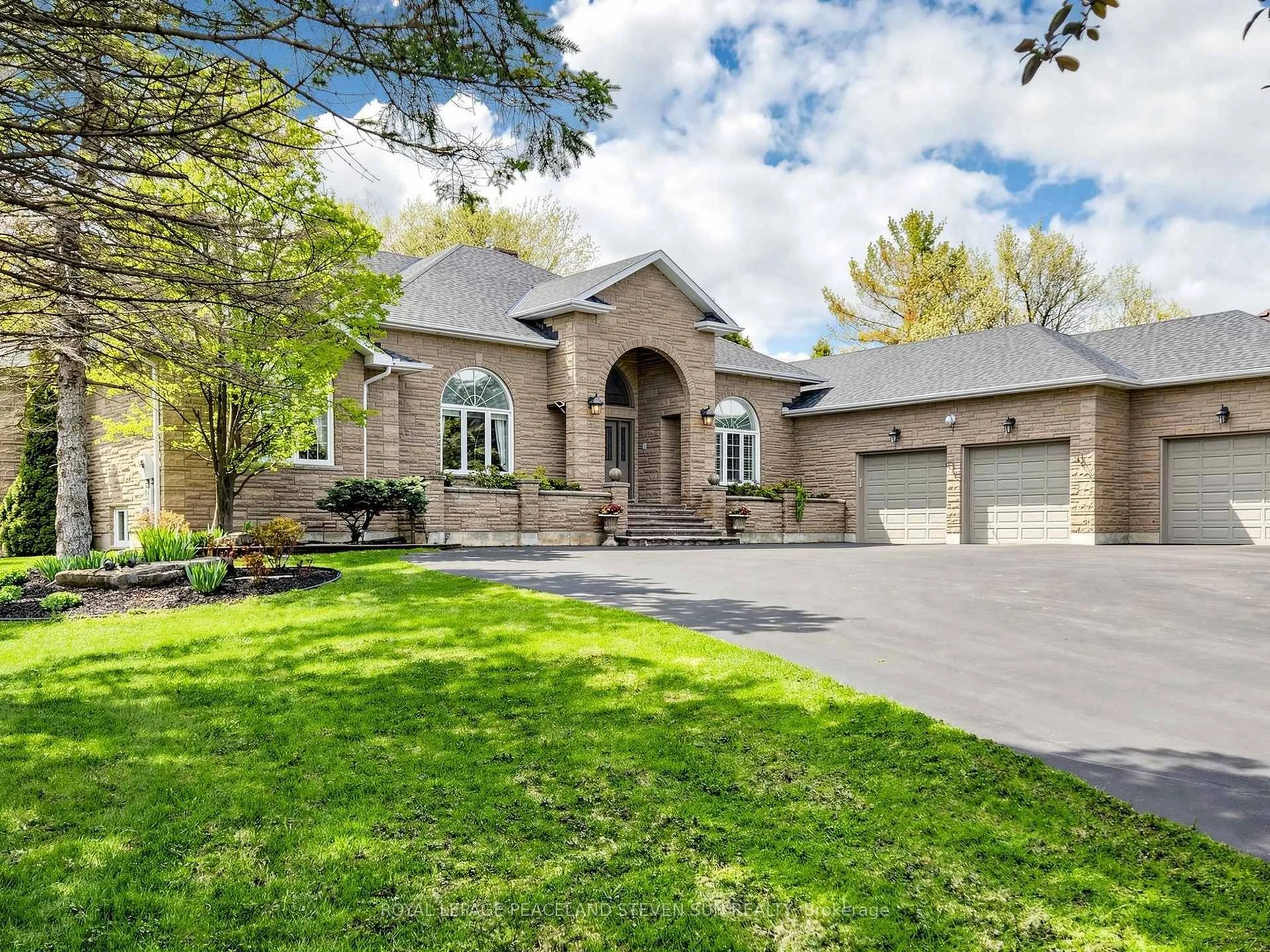 Home with brick exterior material, street for 48 Buggey Lane, Ajax Ontario L1Z 1X5