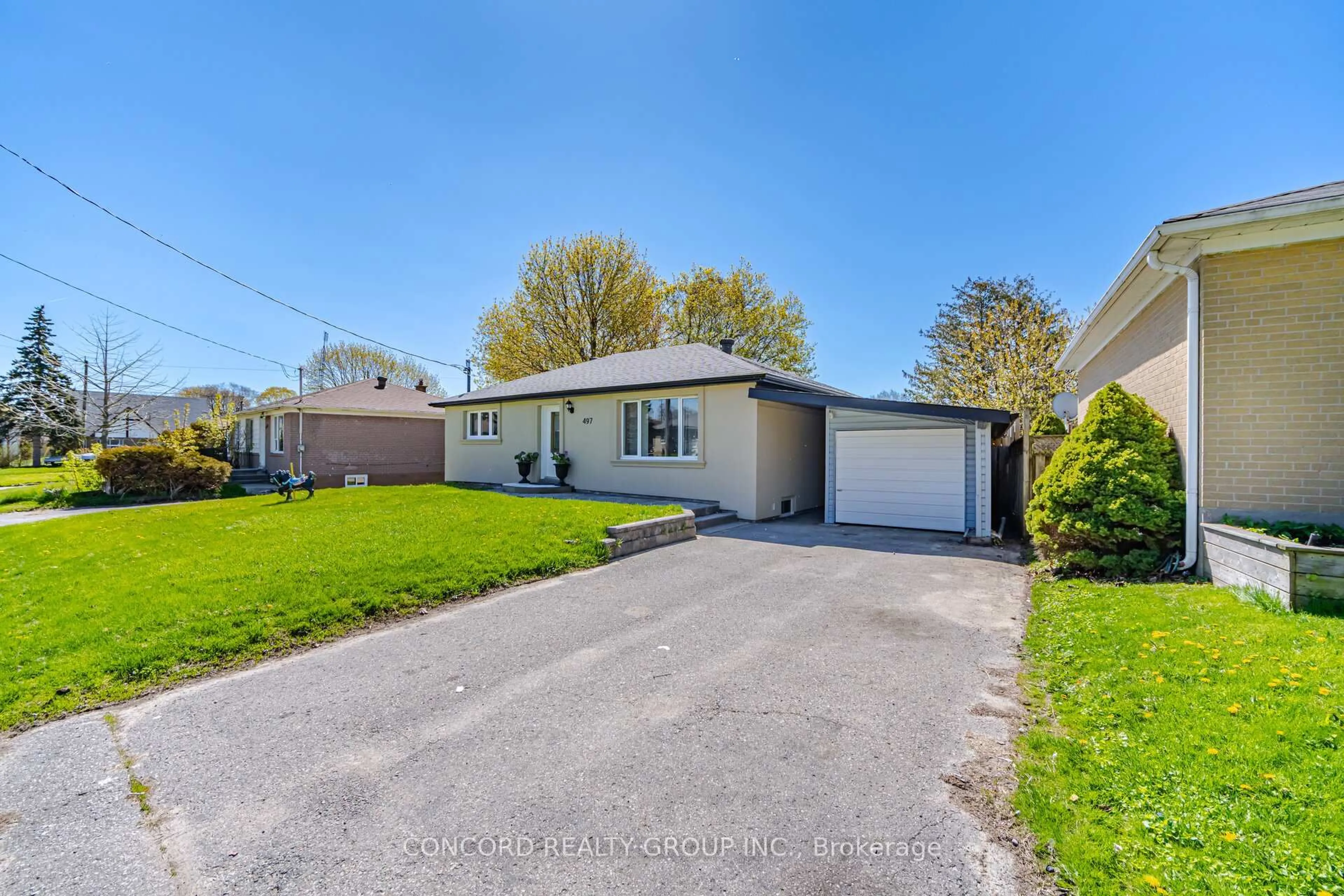 A pic from outside/outdoor area/front of a property/back of a property/a pic from drone, street for 497 Phillip Murray Ave, Oshawa Ontario L1J 1H7
