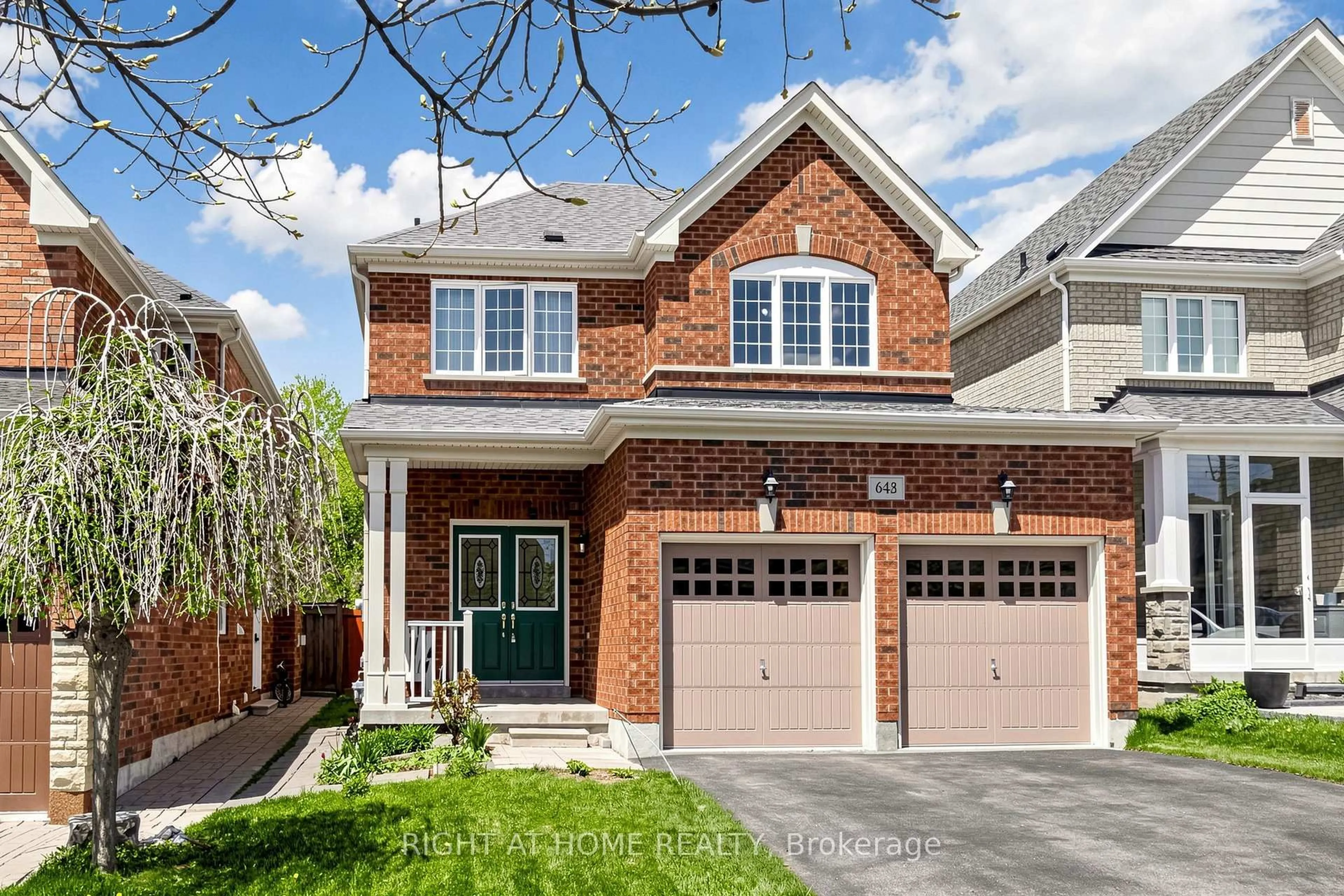 Home with brick exterior material, street for 648 Blackwood Blvd, Oshawa Ontario L1K 0G7