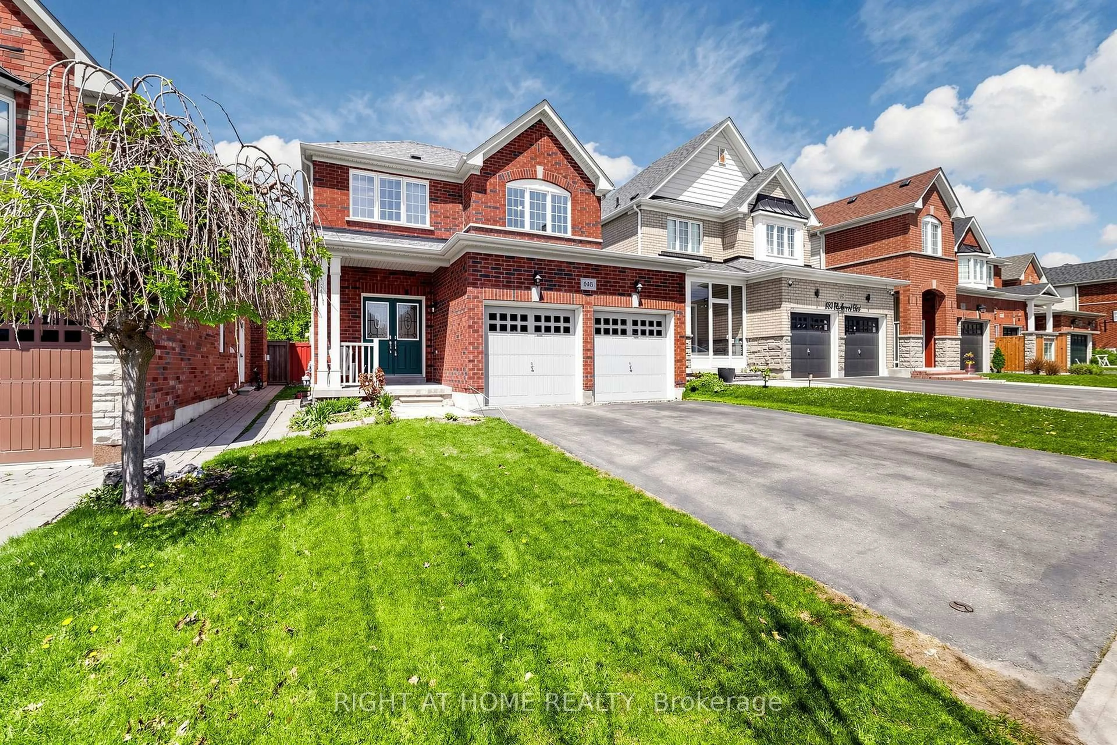 Home with brick exterior material, street for 648 Blackwood Blvd, Oshawa Ontario L1K 0G7
