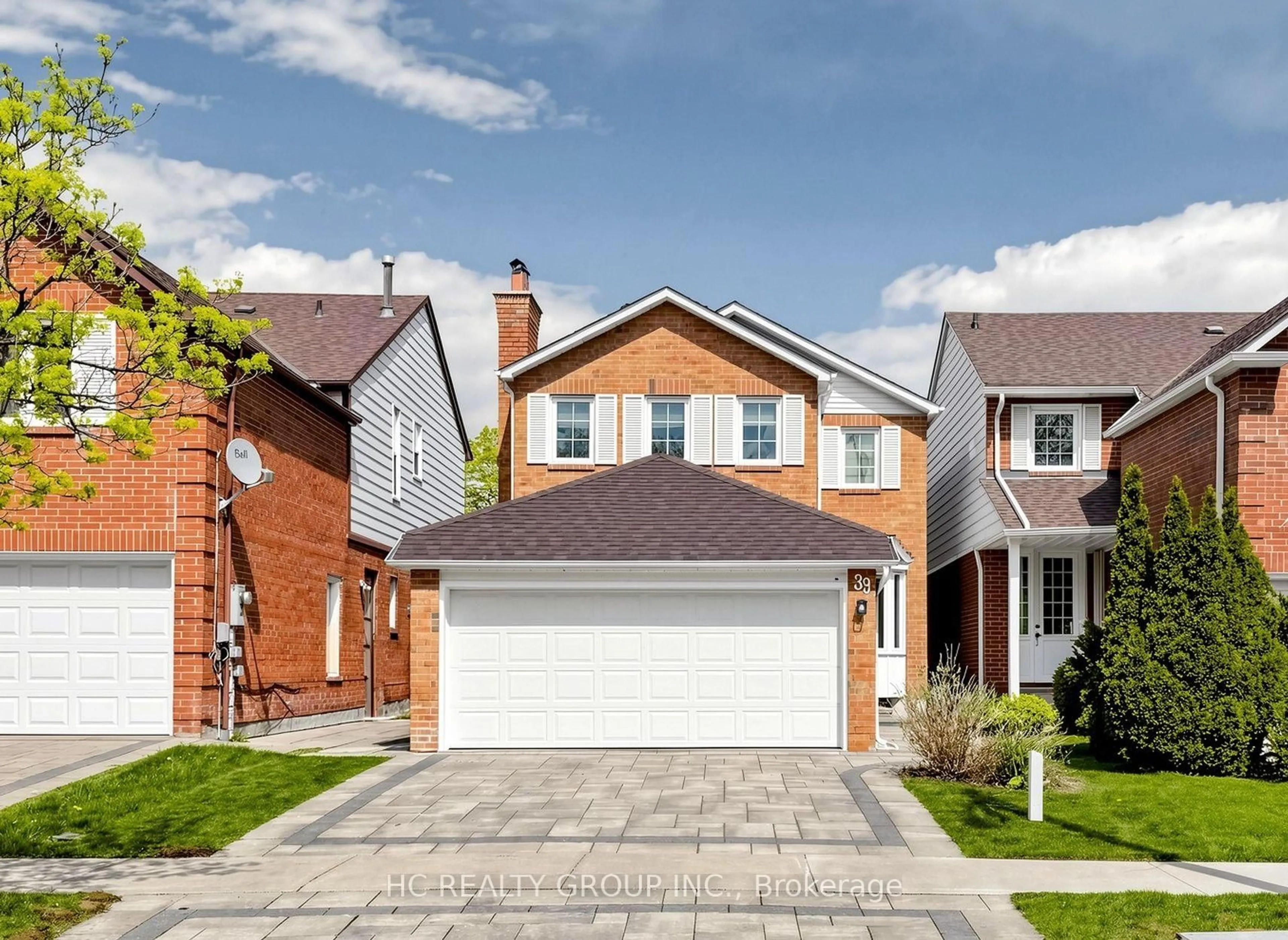 Home with brick exterior material, street for 39 River Grove Dr, Toronto Ontario M1W 3T8