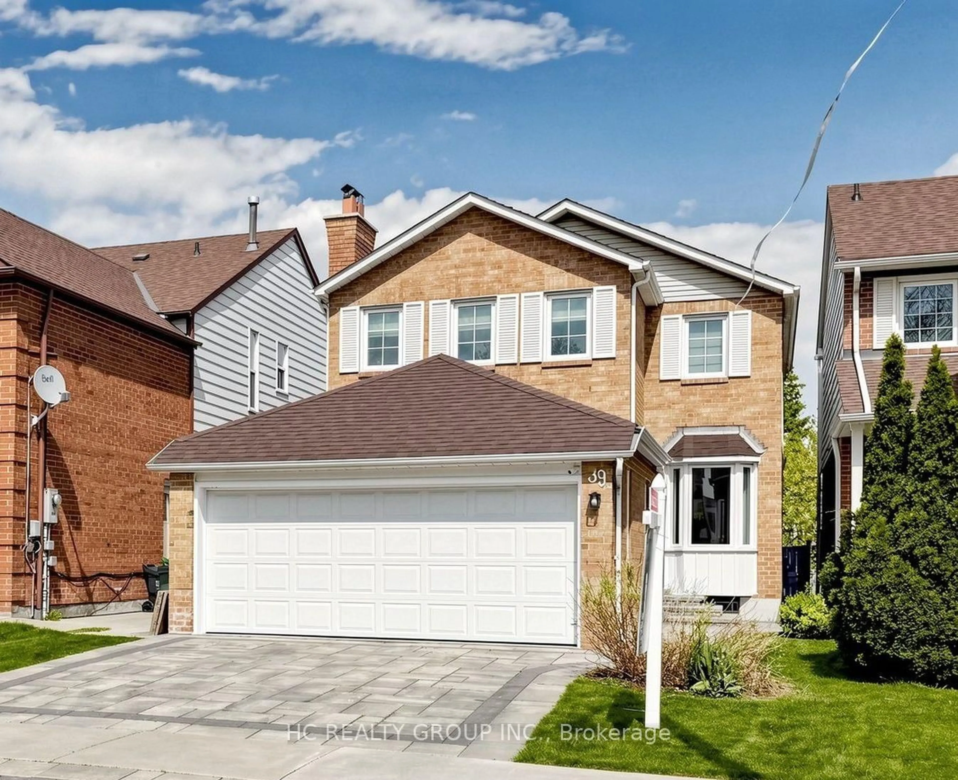 Home with brick exterior material, street for 39 River Grove Dr, Toronto Ontario M1W 3T8