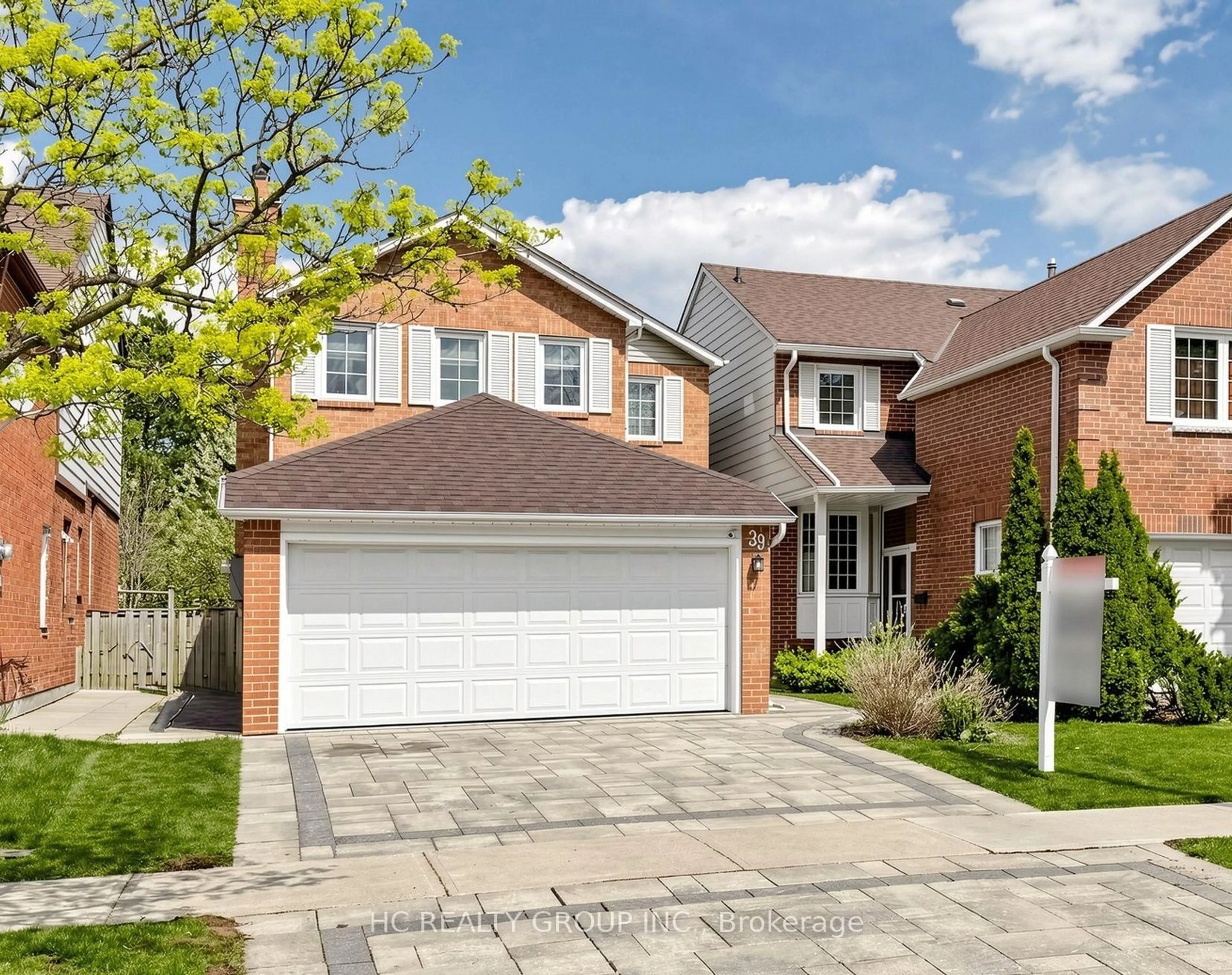 Home with brick exterior material, street for 39 River Grove Dr, Toronto Ontario M1W 3T8