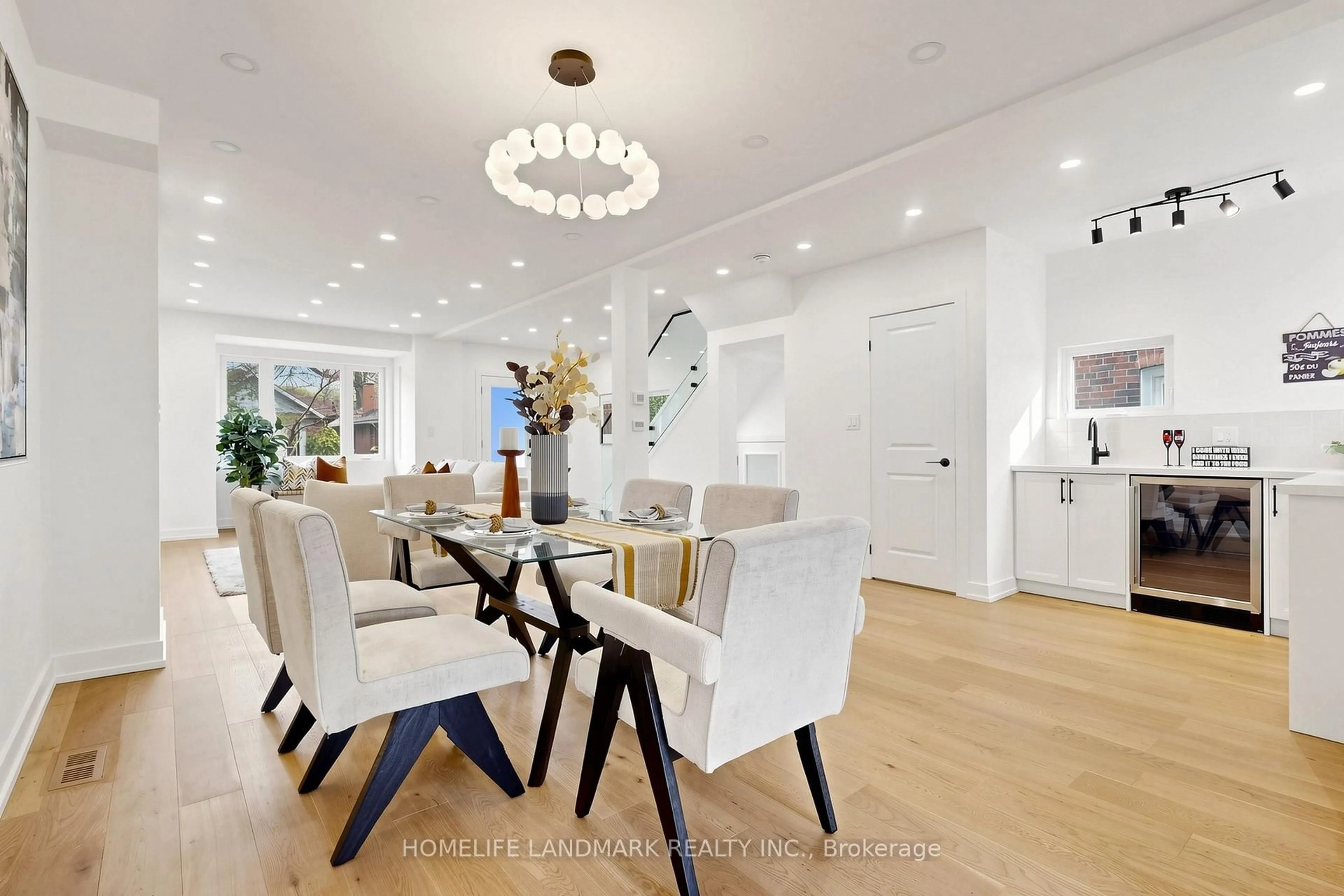Dining room, wood/laminate floor for 55 Chilton Rd, Toronto Ontario M4J 3C7