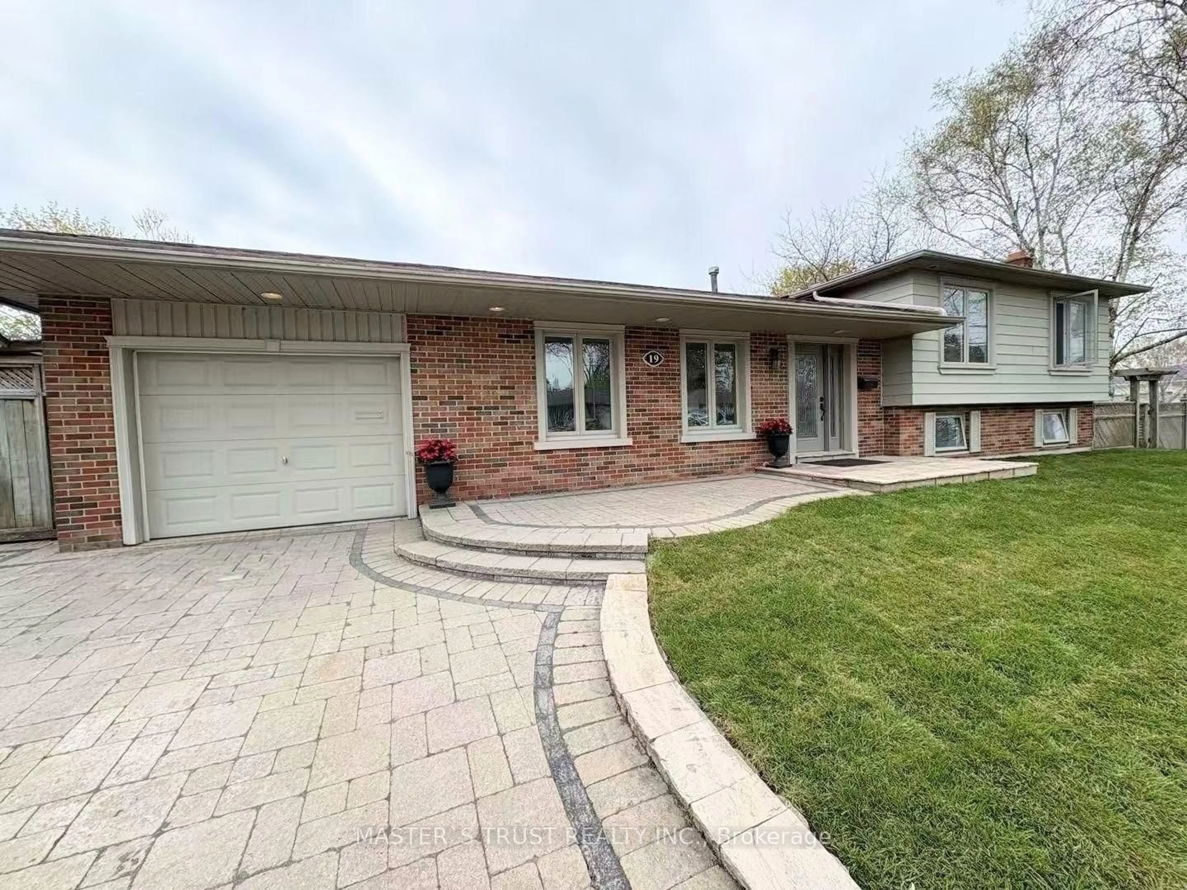 Home with brick exterior material, street for 19 Cockburn Dr, Toronto Ontario M1C 2T1