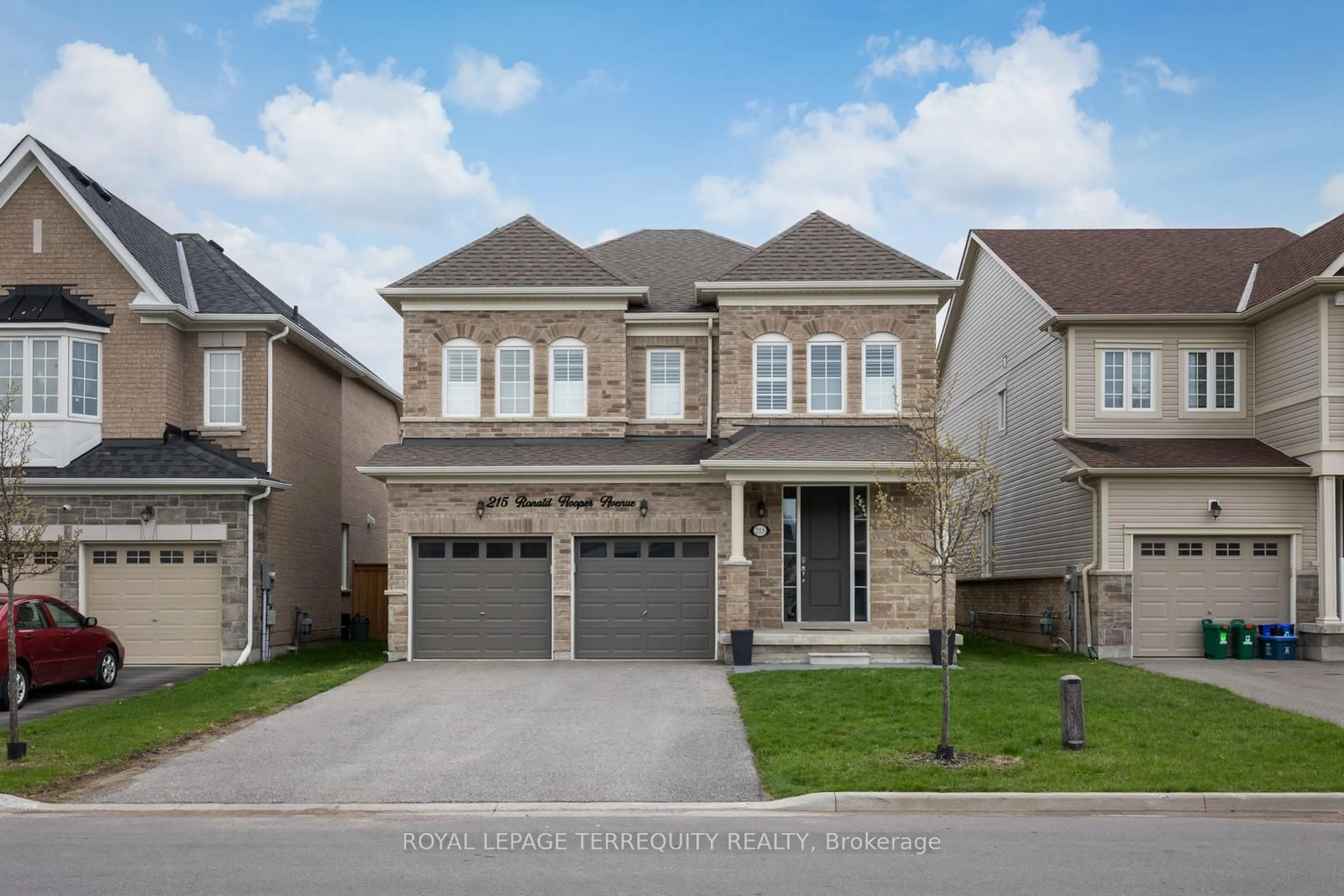 Home with brick exterior material, street for 215 Ronald Hooper Ave, Clarington Ontario L1C 7E1