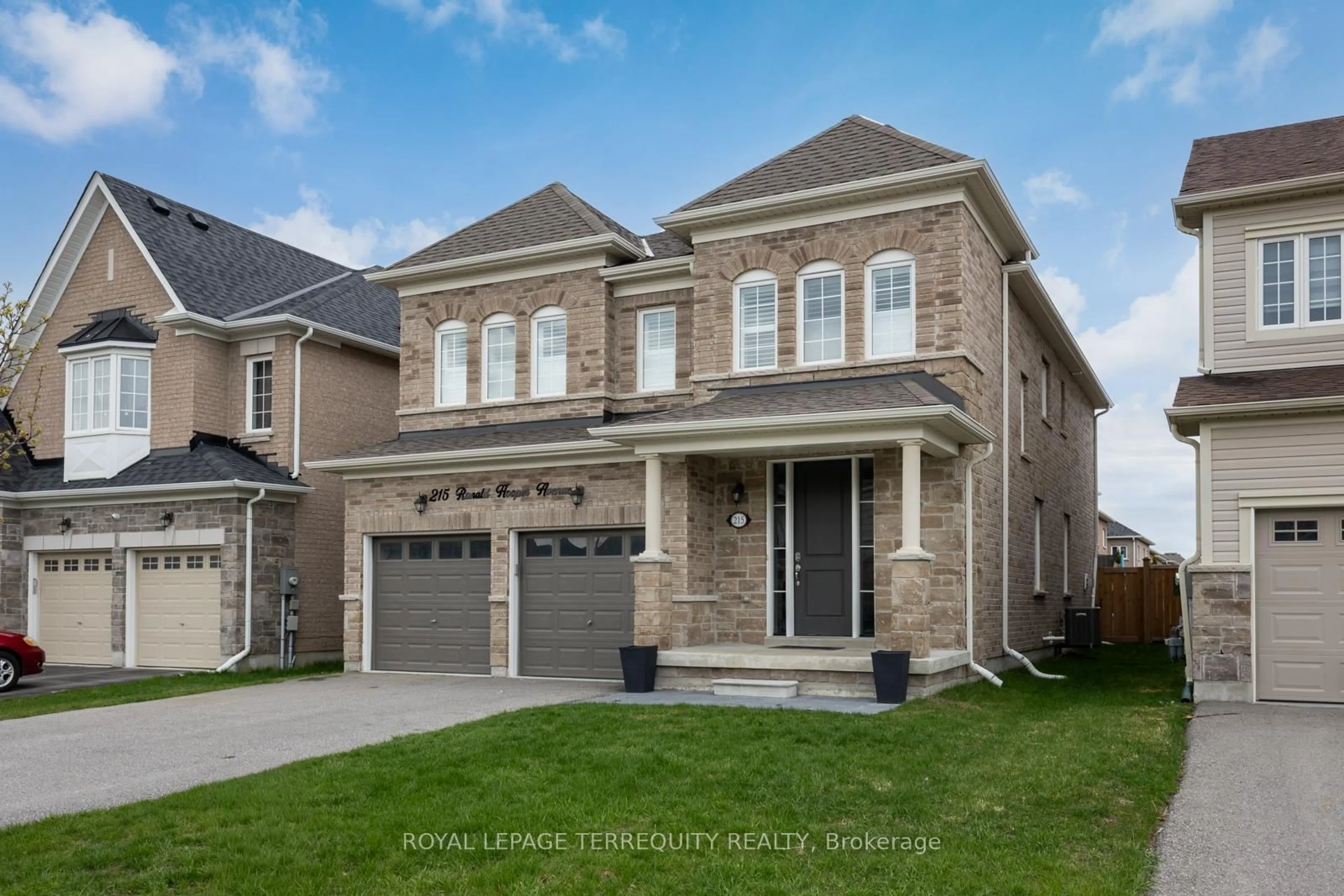 Home with brick exterior material, street for 215 Ronald Hooper Ave, Clarington Ontario L1C 7E1