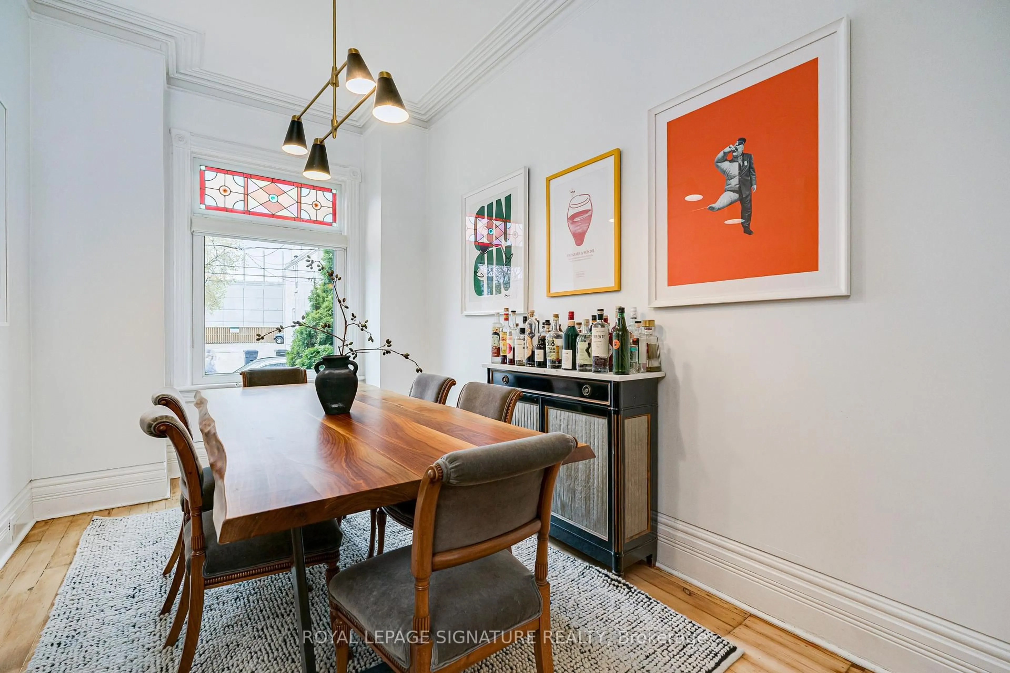 Dining room, wood/laminate floor for 61 Mcgee St, Toronto Ontario M4M 2L1
