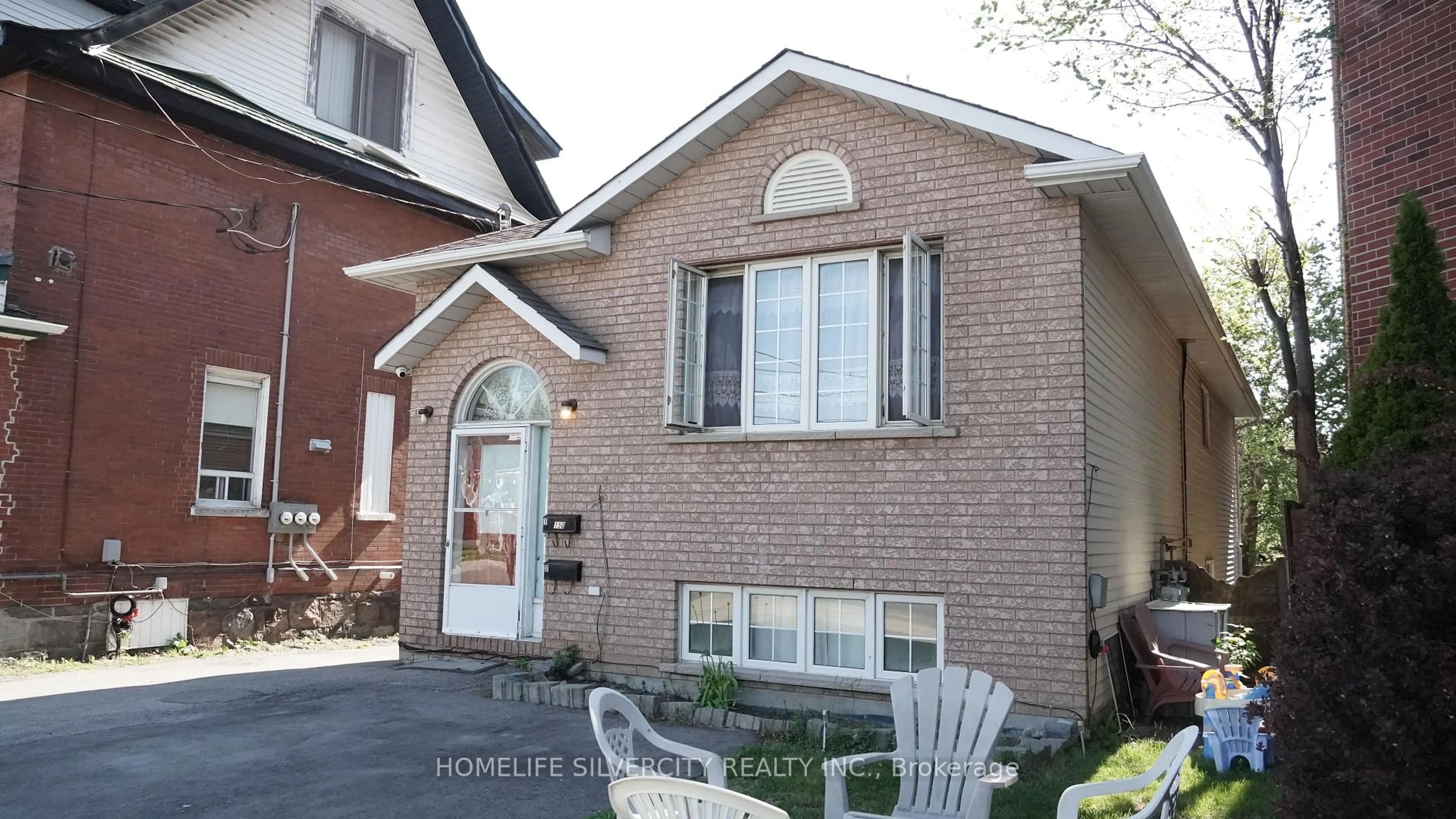 Home with brick exterior material, street for 150 Centre St, Oshawa Ontario L1H 4A4