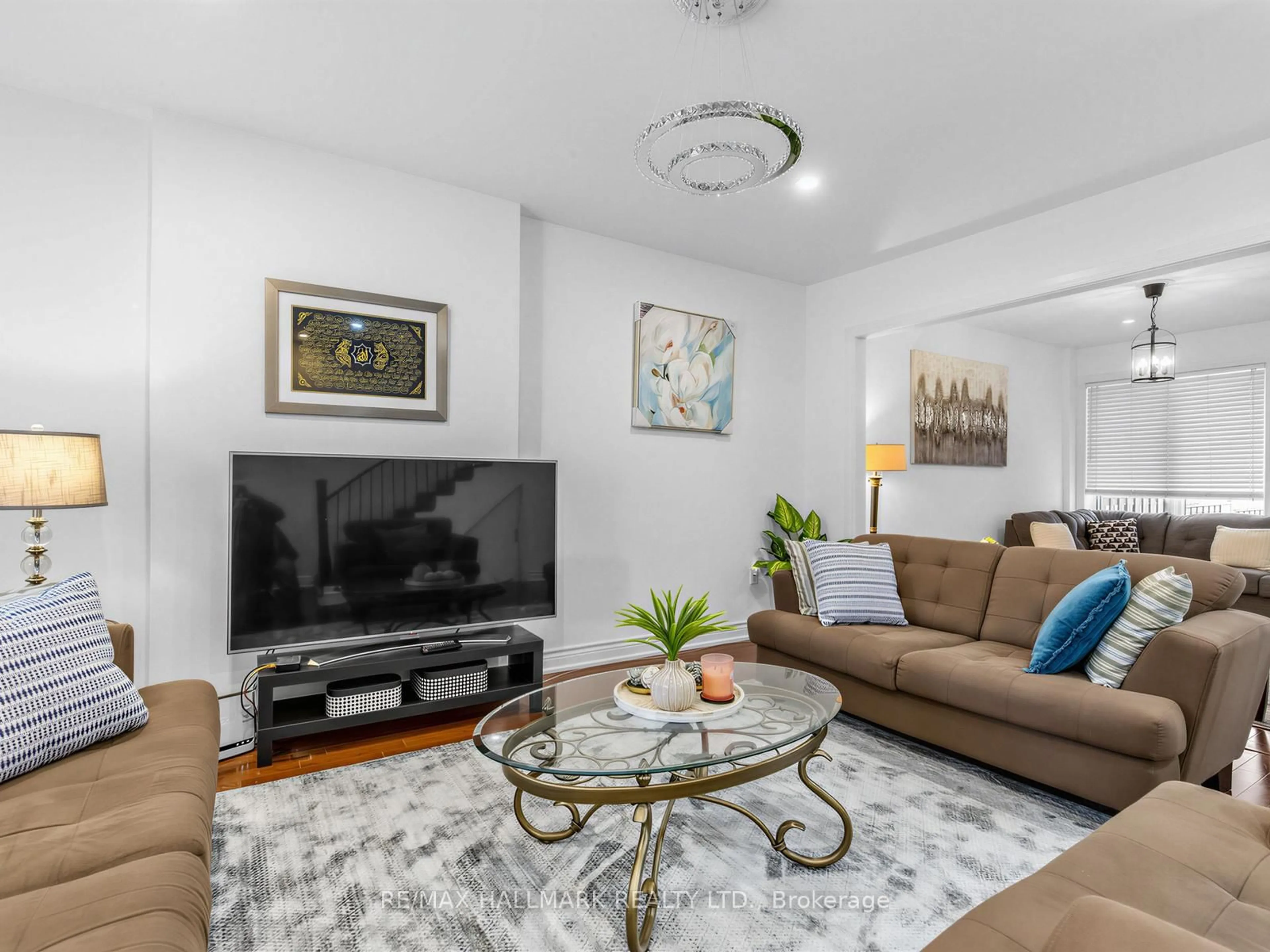Living room with furniture, unknown for 64 Donlands Ave, Toronto Ontario M4J 3N8