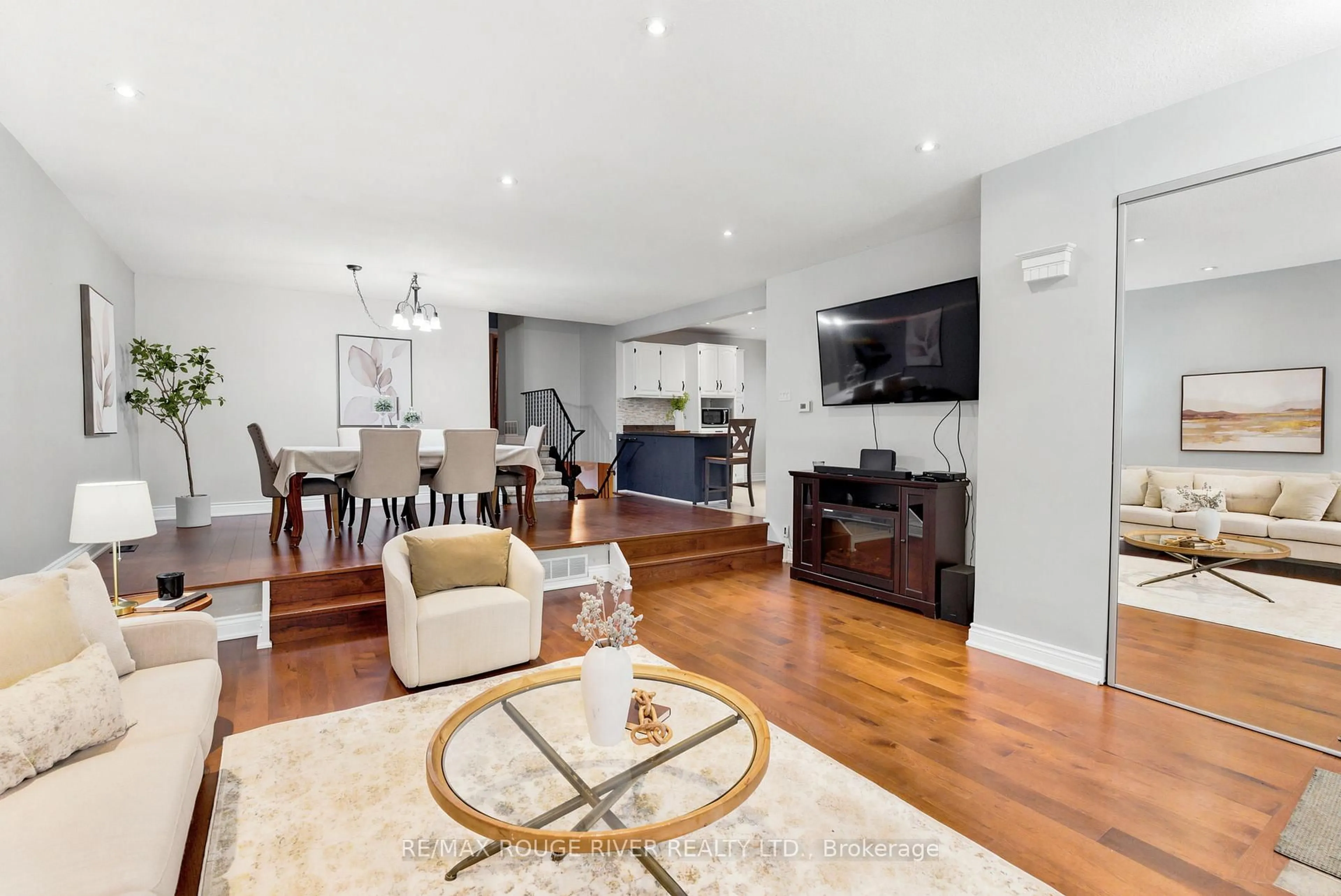 Living room with furniture, wood/laminate floor for 1125 Byron St, Whitby Ontario L1N 4S4