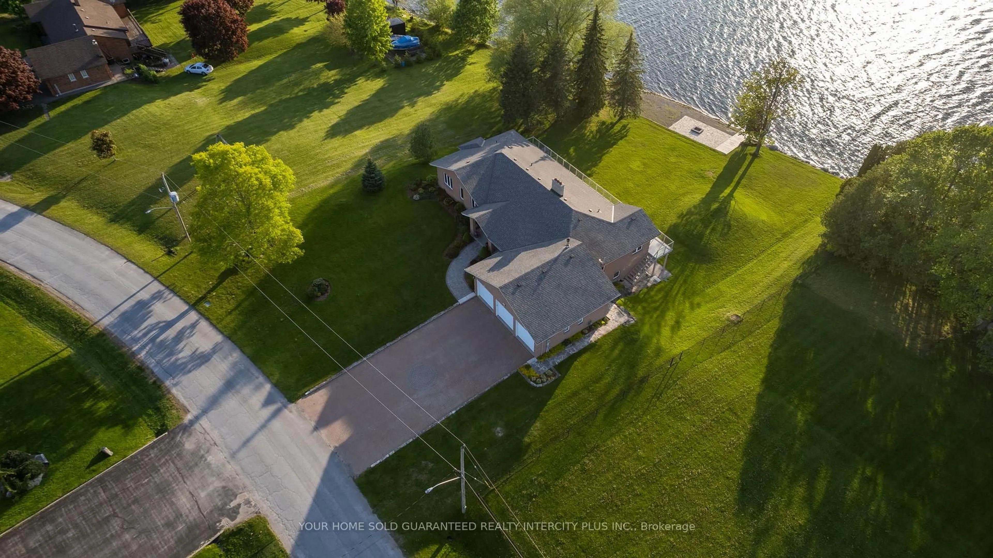 A pic from outside/outdoor area/front of a property/back of a property/a pic from drone, water/lake/river/ocean view for 592 Fralick's Beach Rd, Scugog Ontario L9L 1B6