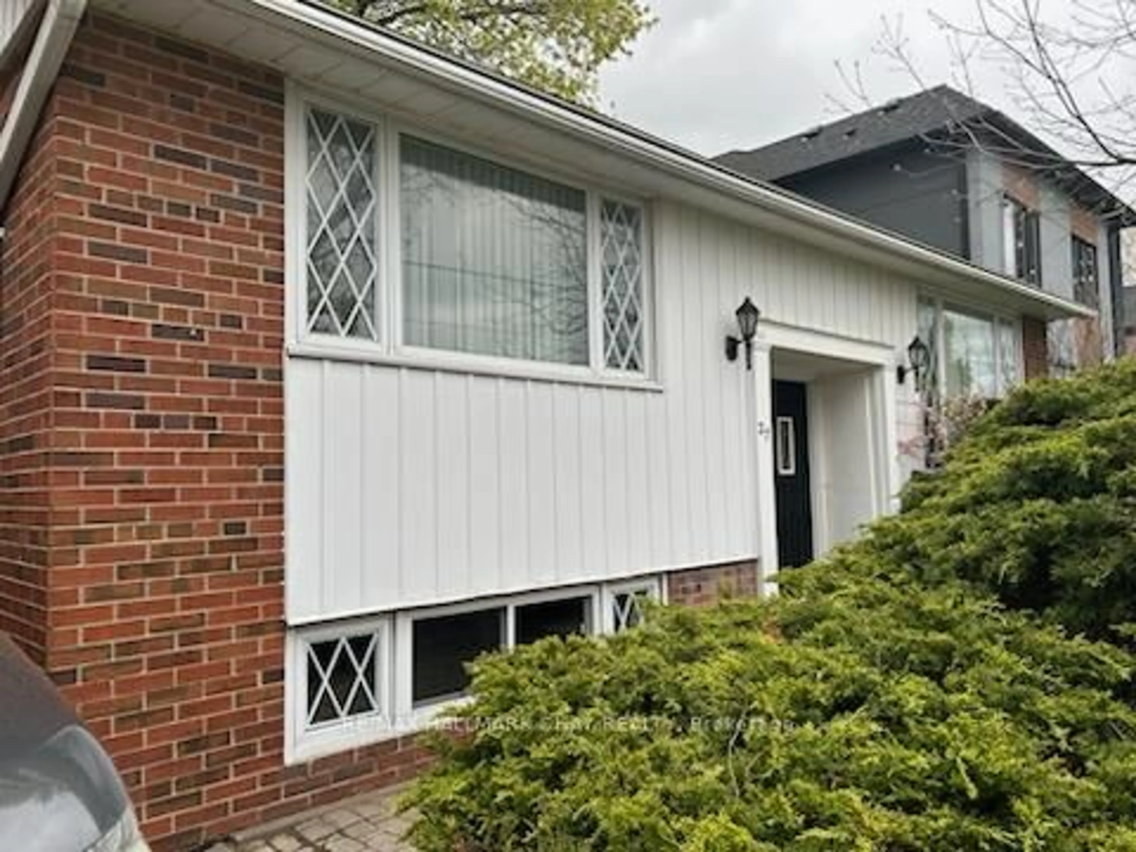 Home with vinyl exterior material, street for 27 Elfreda Blvd, Toronto Ontario M1L 4L5