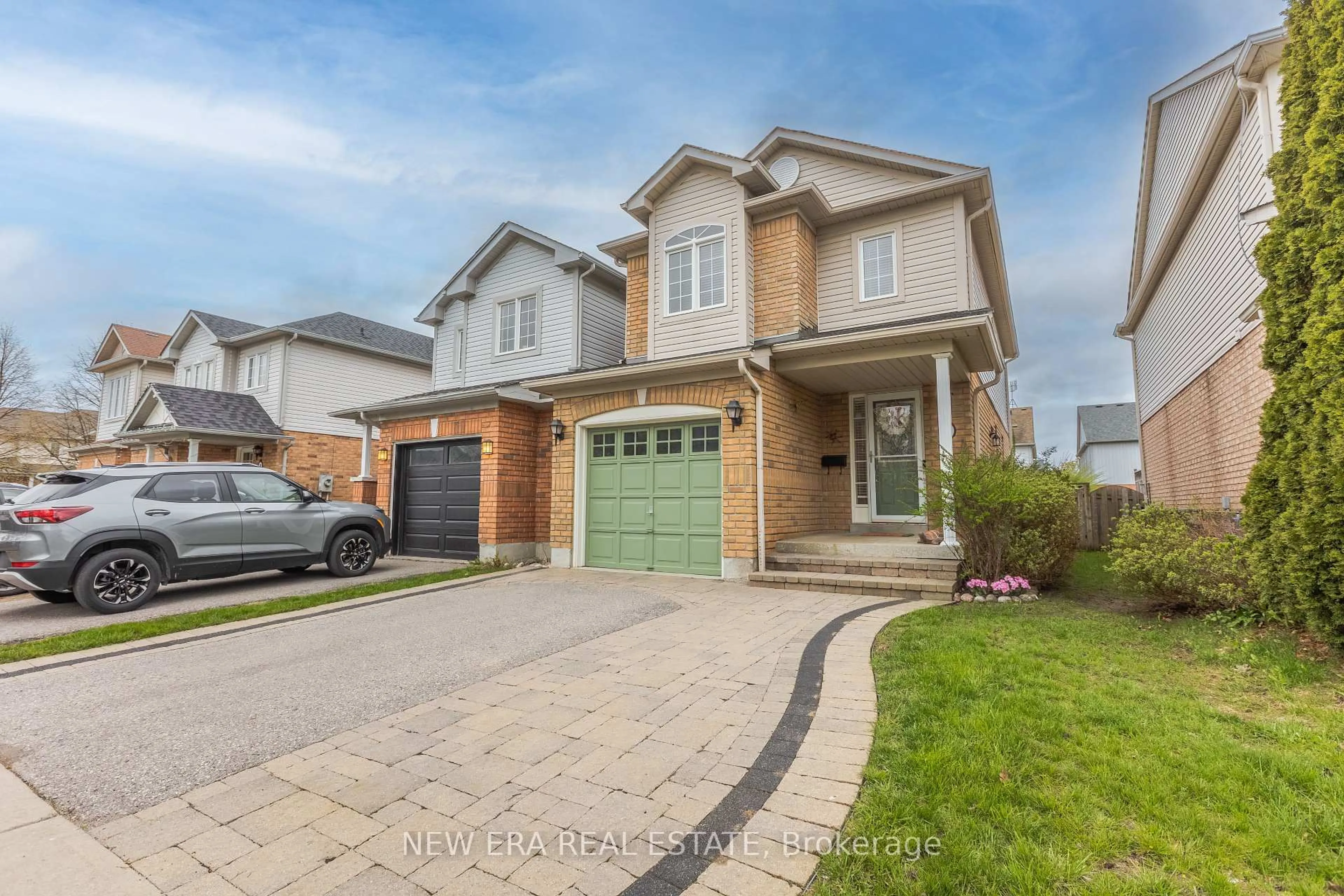 Home with brick exterior material, street for 7 Catkins Cres, Whitby Ontario L1R 3A2