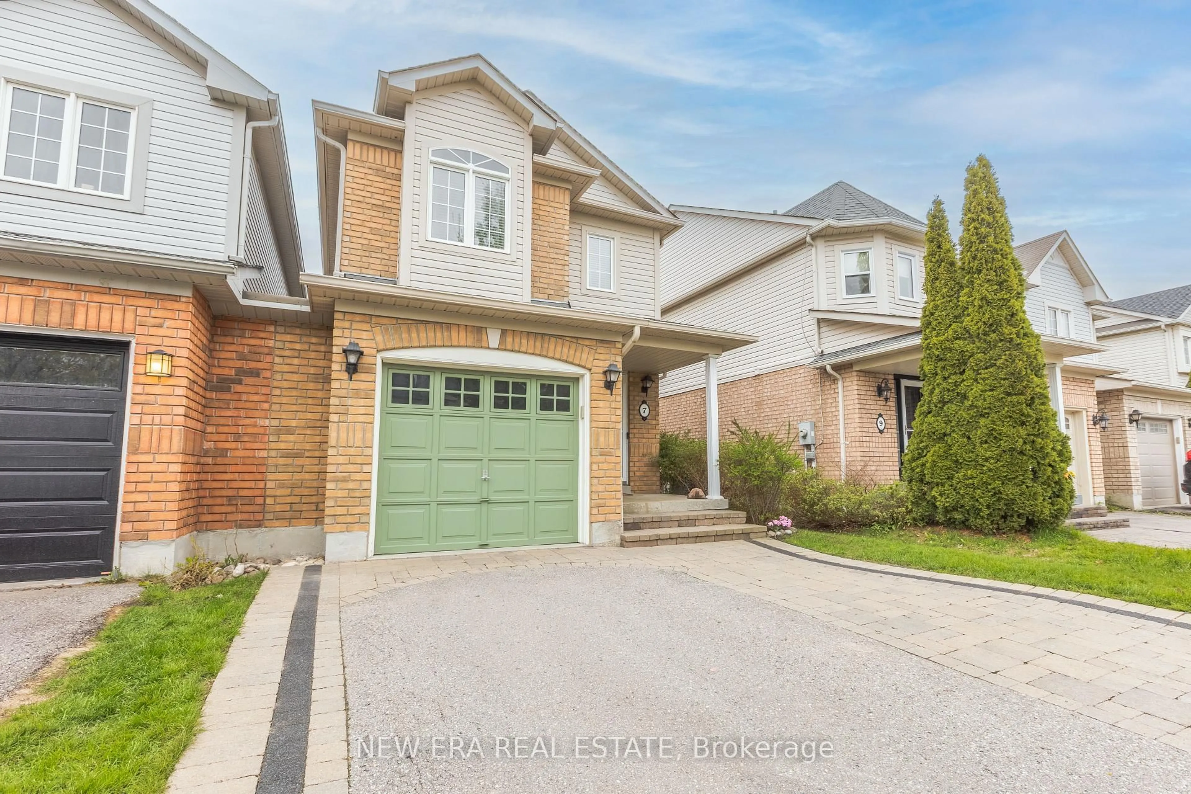 Home with brick exterior material, street for 7 Catkins Cres, Whitby Ontario L1R 3A2