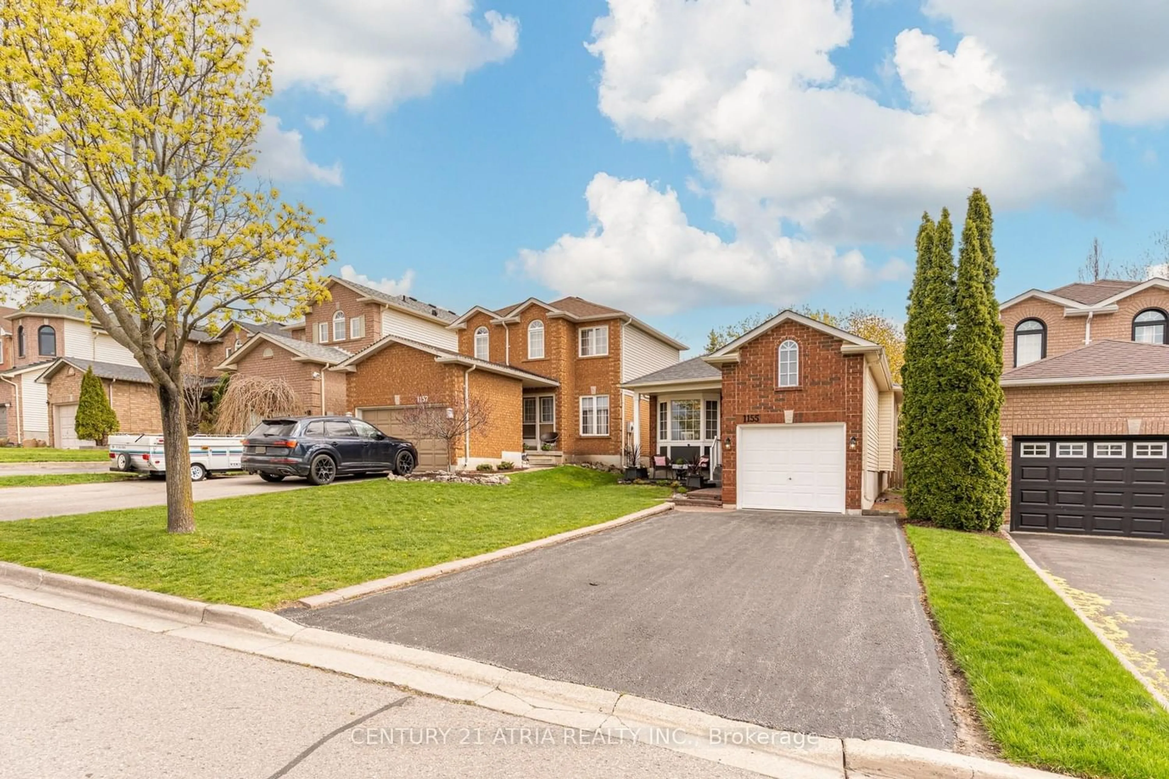 Home with brick exterior material, street for 1155 Ridgemount Blvd, Oshawa Ontario L1K 2L2