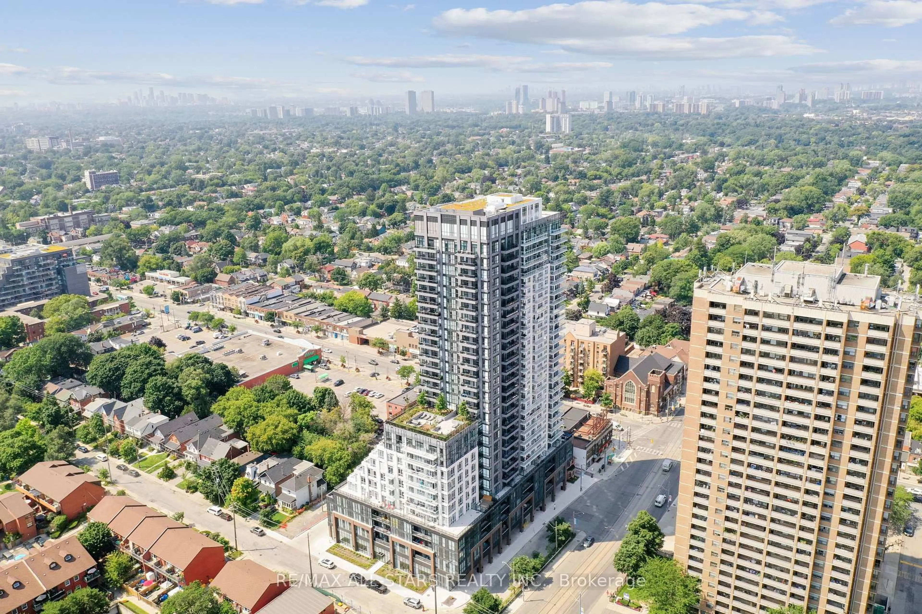 A pic from outside/outdoor area/front of a property/back of a property/a pic from drone, city buildings view from balcony for 286 Main St #2301, Toronto Ontario M4C 0B3