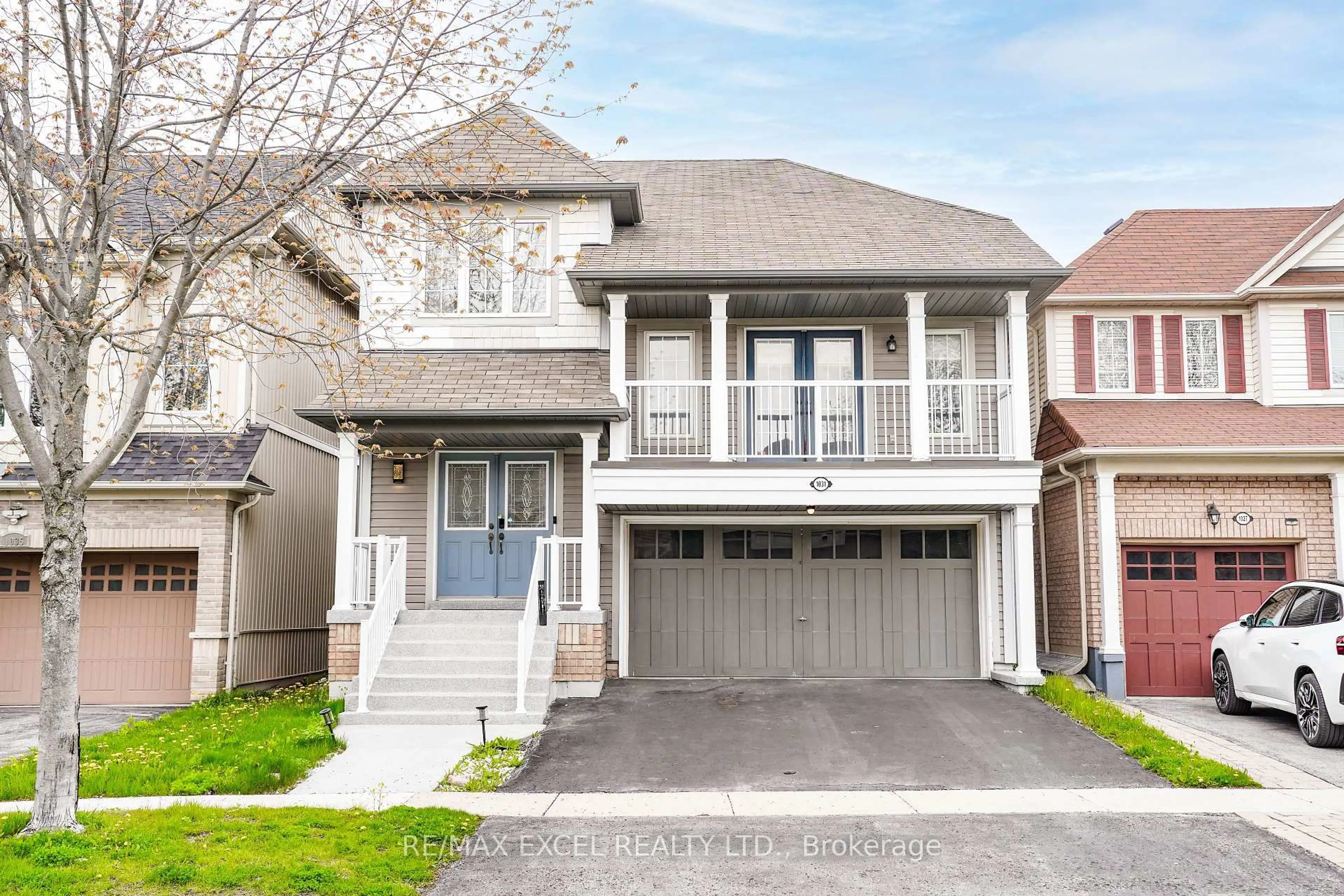 Home with vinyl exterior material, street for 1031 Beneford Rd, Oshawa Ontario L1K 0A3