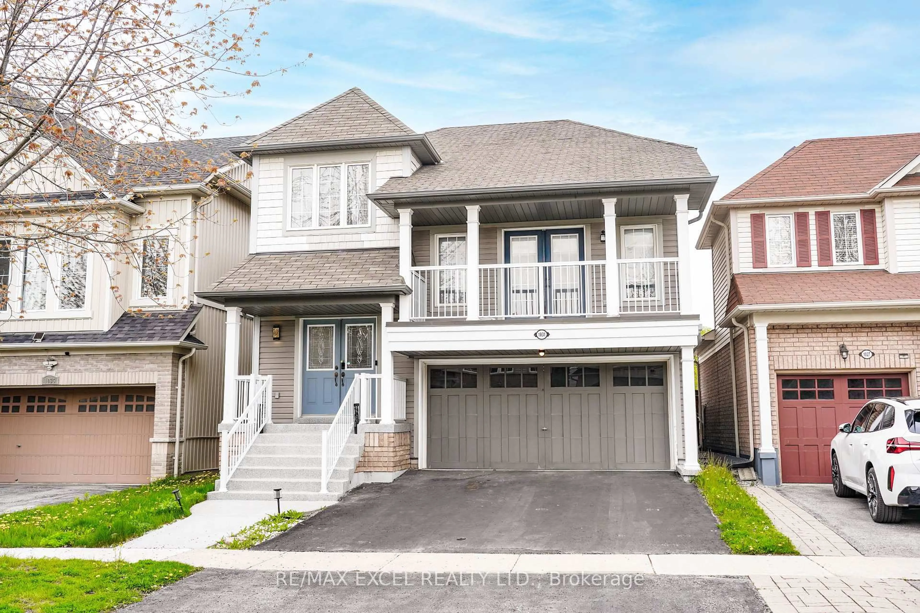 Home with vinyl exterior material, street for 1031 Beneford Rd, Oshawa Ontario L1K 0A3