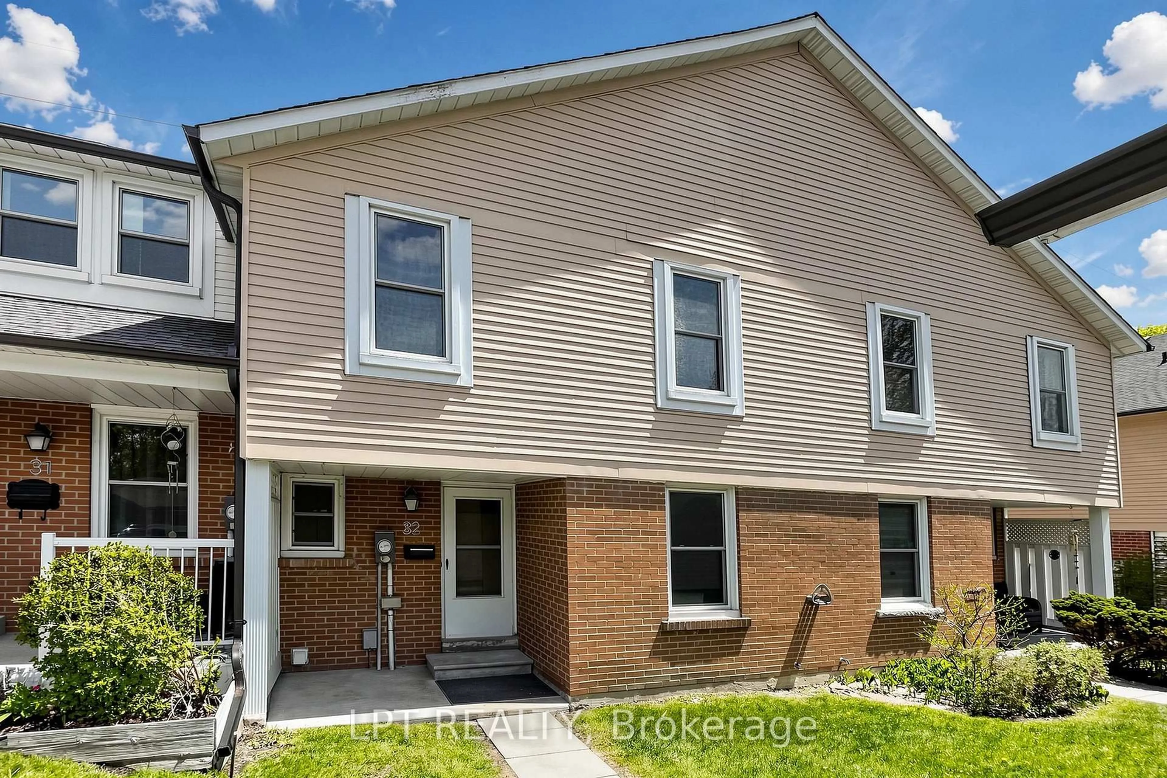 Home with brick exterior material, street for 1055 Central Pk Blvd #32, Oshawa Ontario L1G 7M4